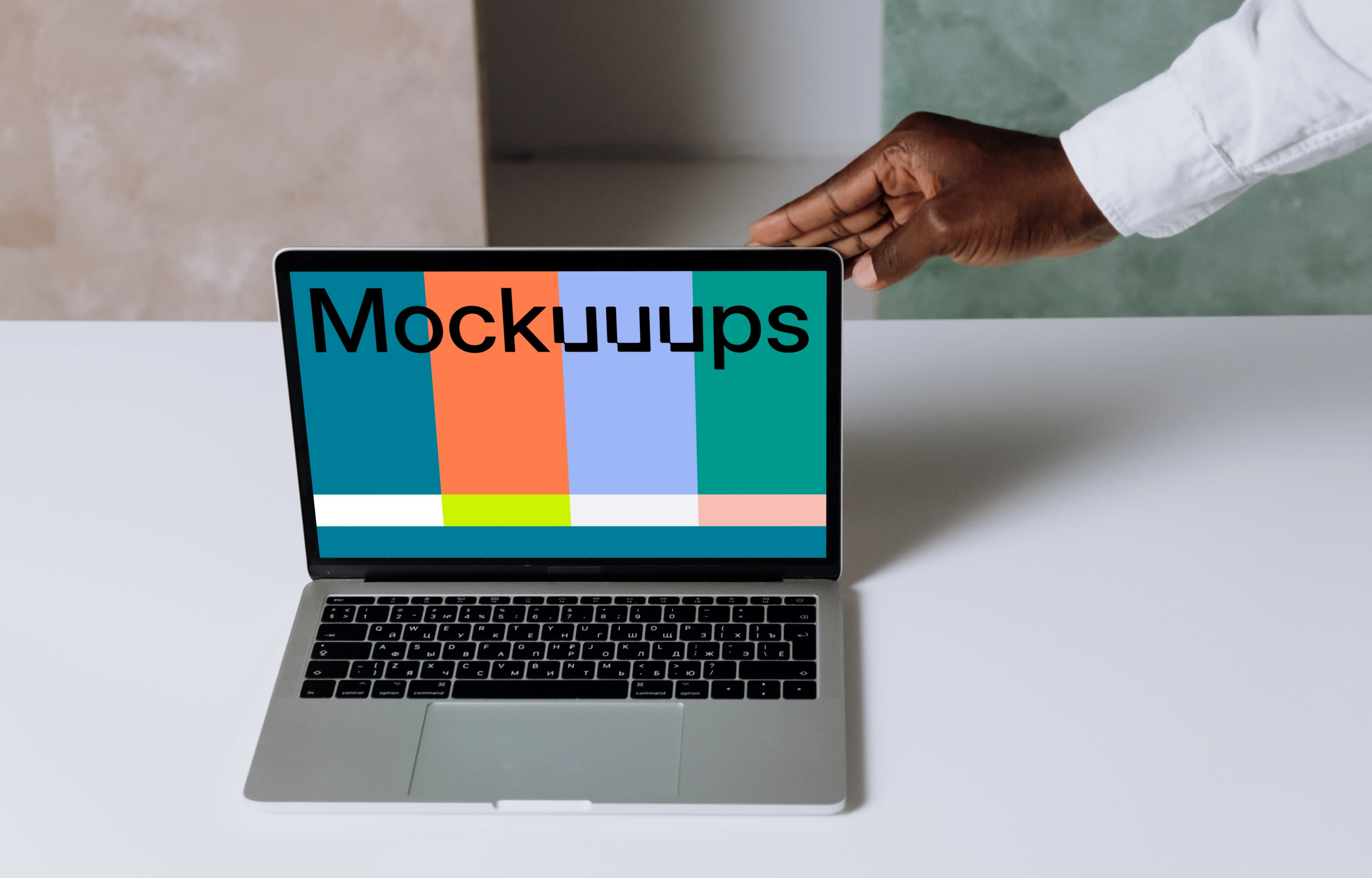 MacBook Pro mockup on a white table in presentation view