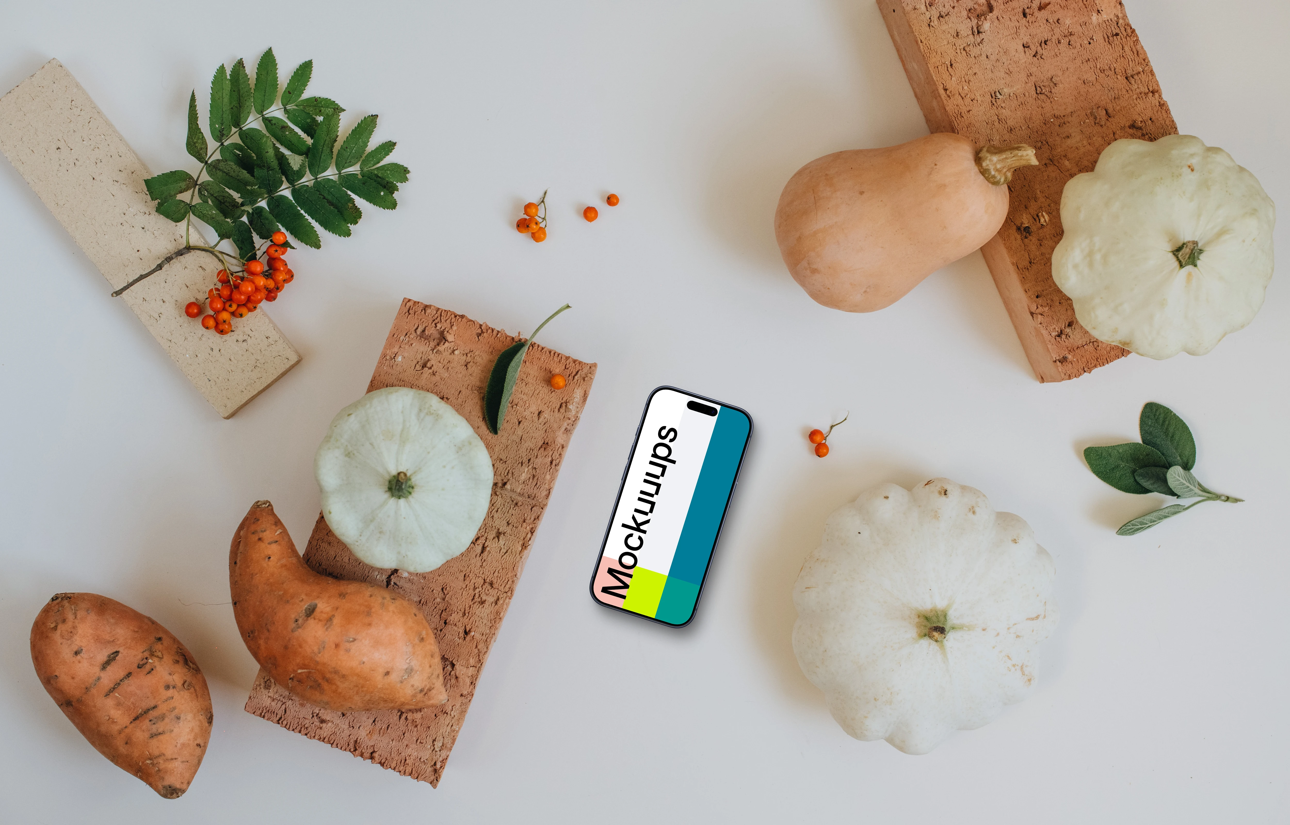 Phone mockup surrounded by vegetables