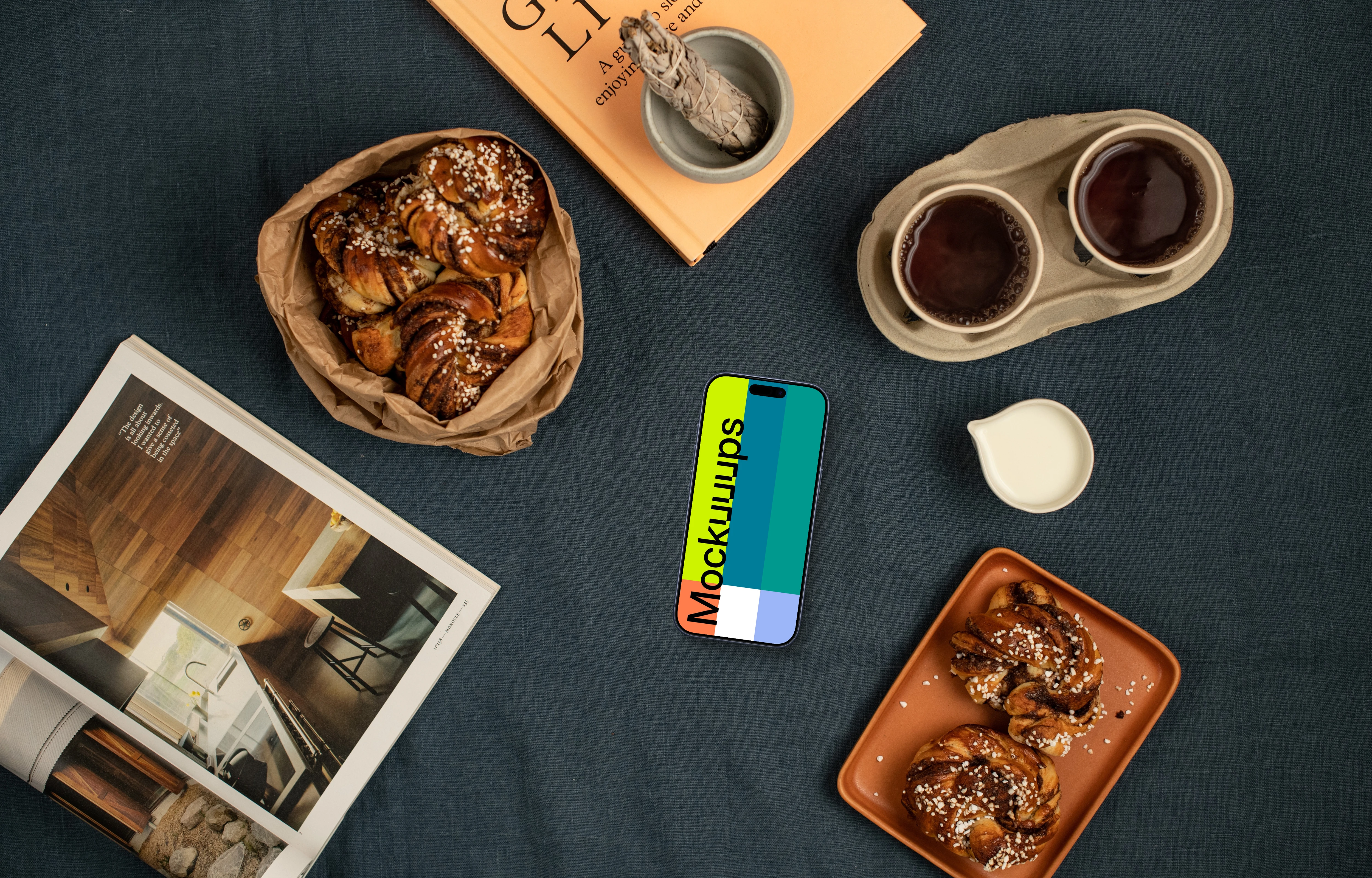 Smartphone mockup with coffee and pastries