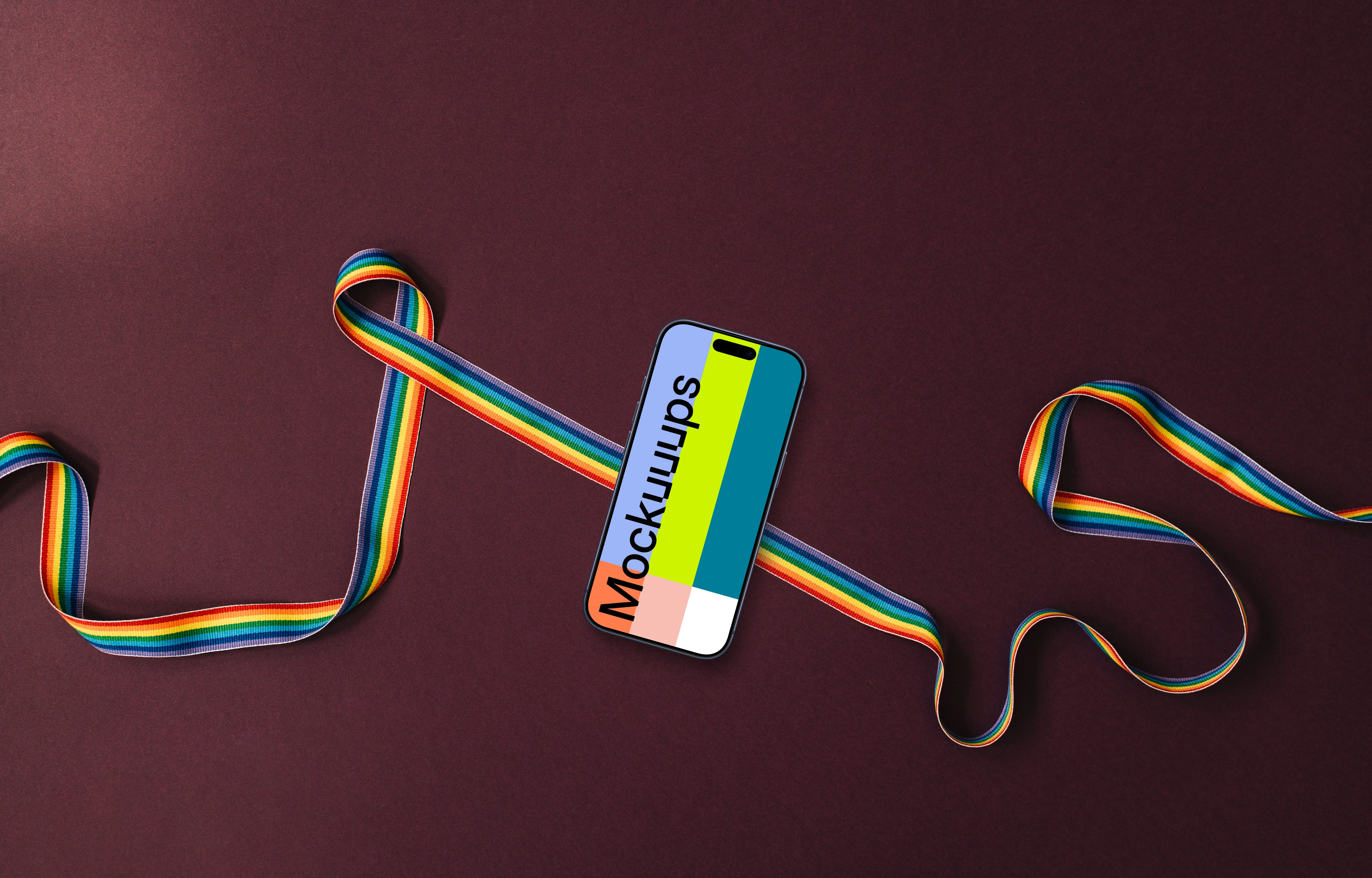Smartphone placed on a twisted pride ribbon