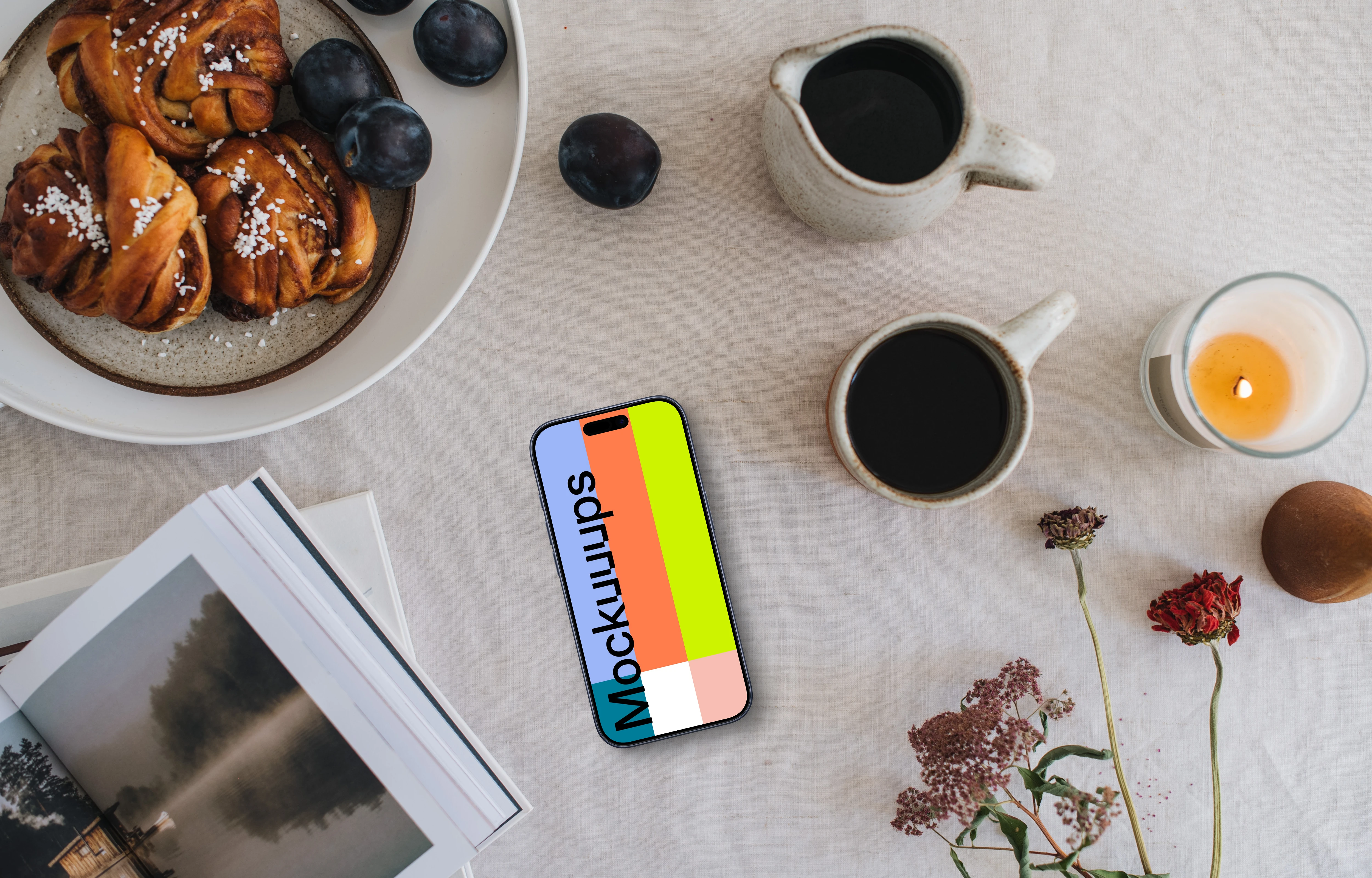 Top view of phone mockup next to the coffee