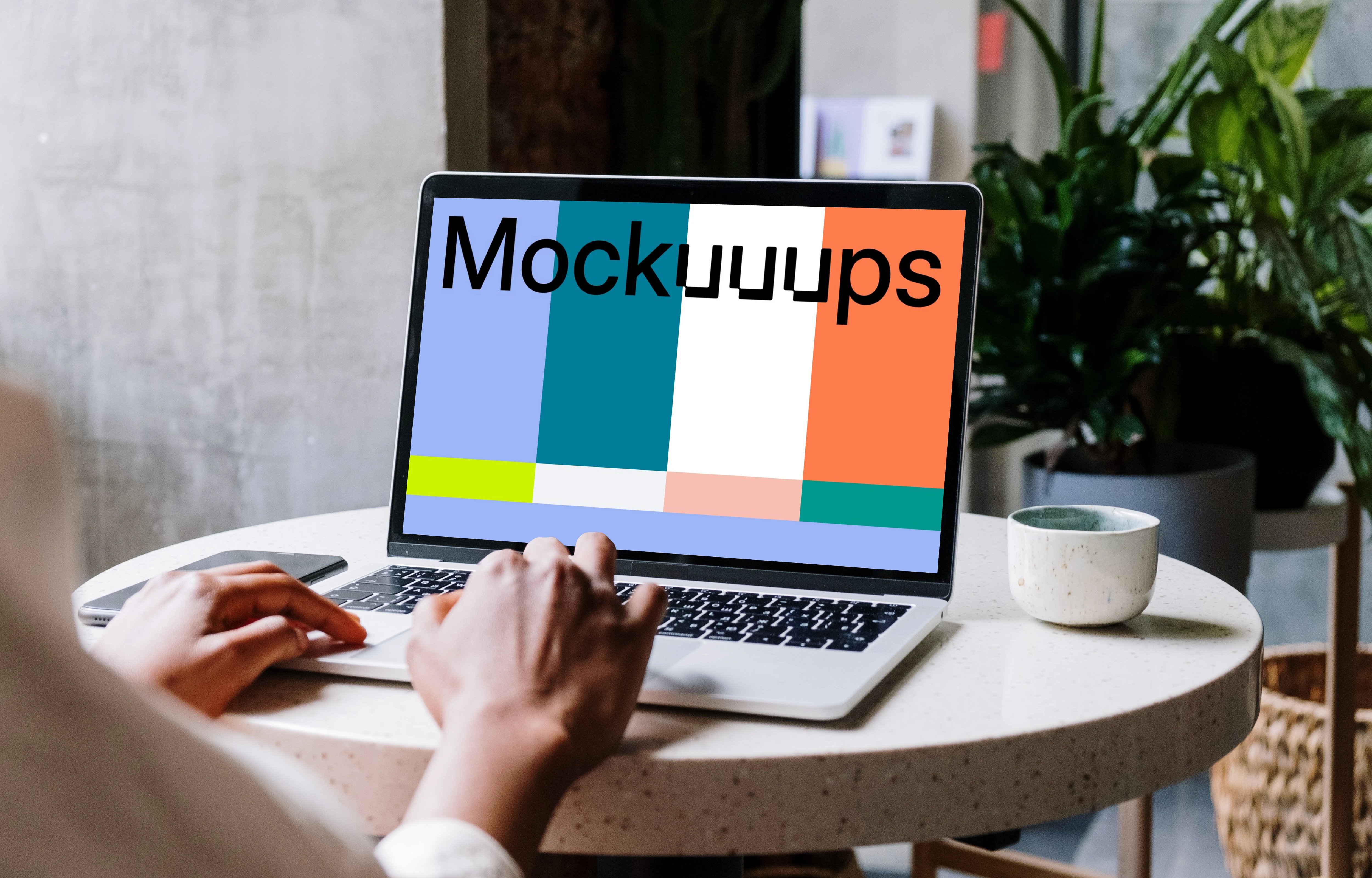 White MacBook mockup close up  on the table