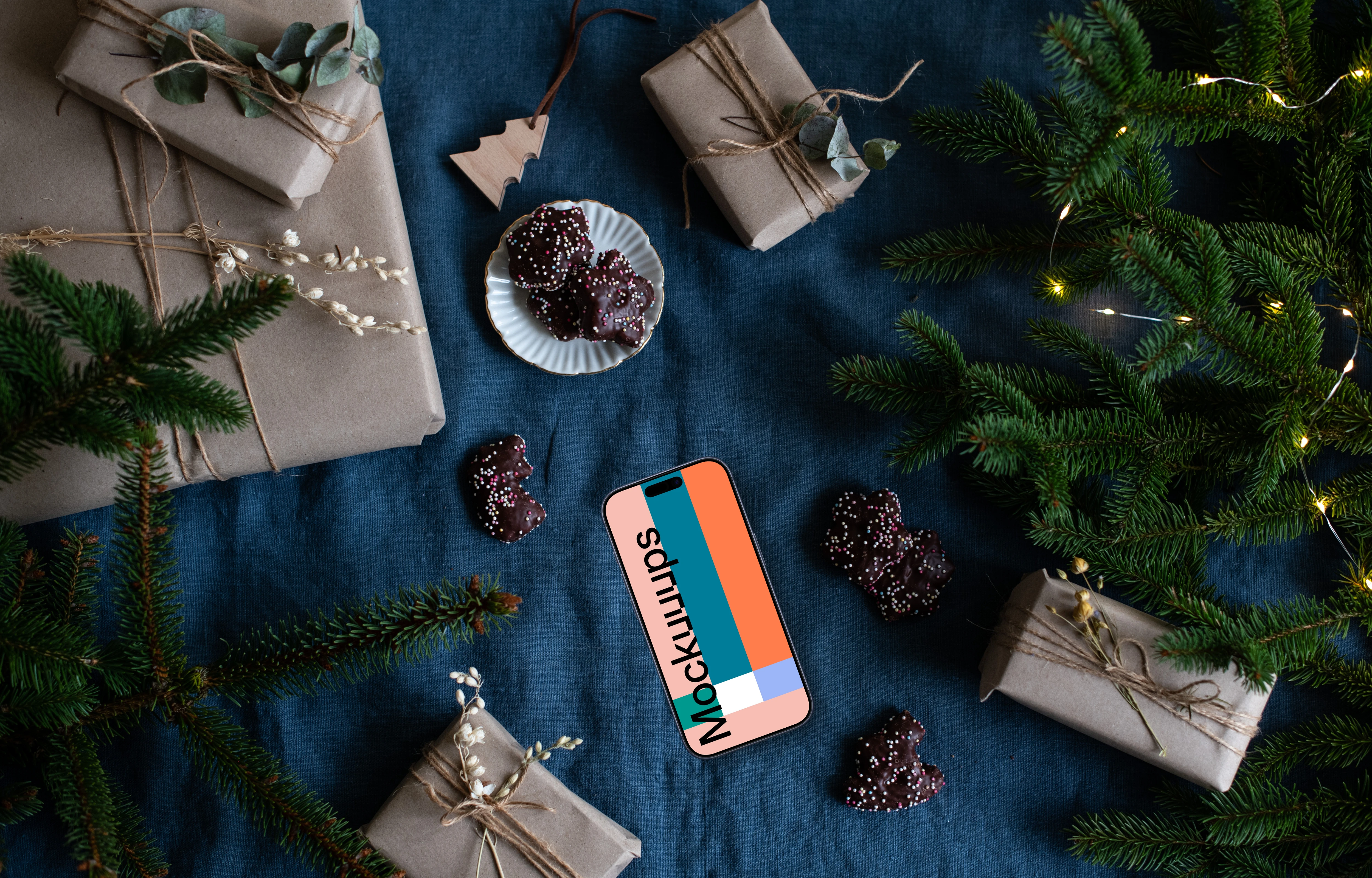 Xmas phone mockup with gifts on the side