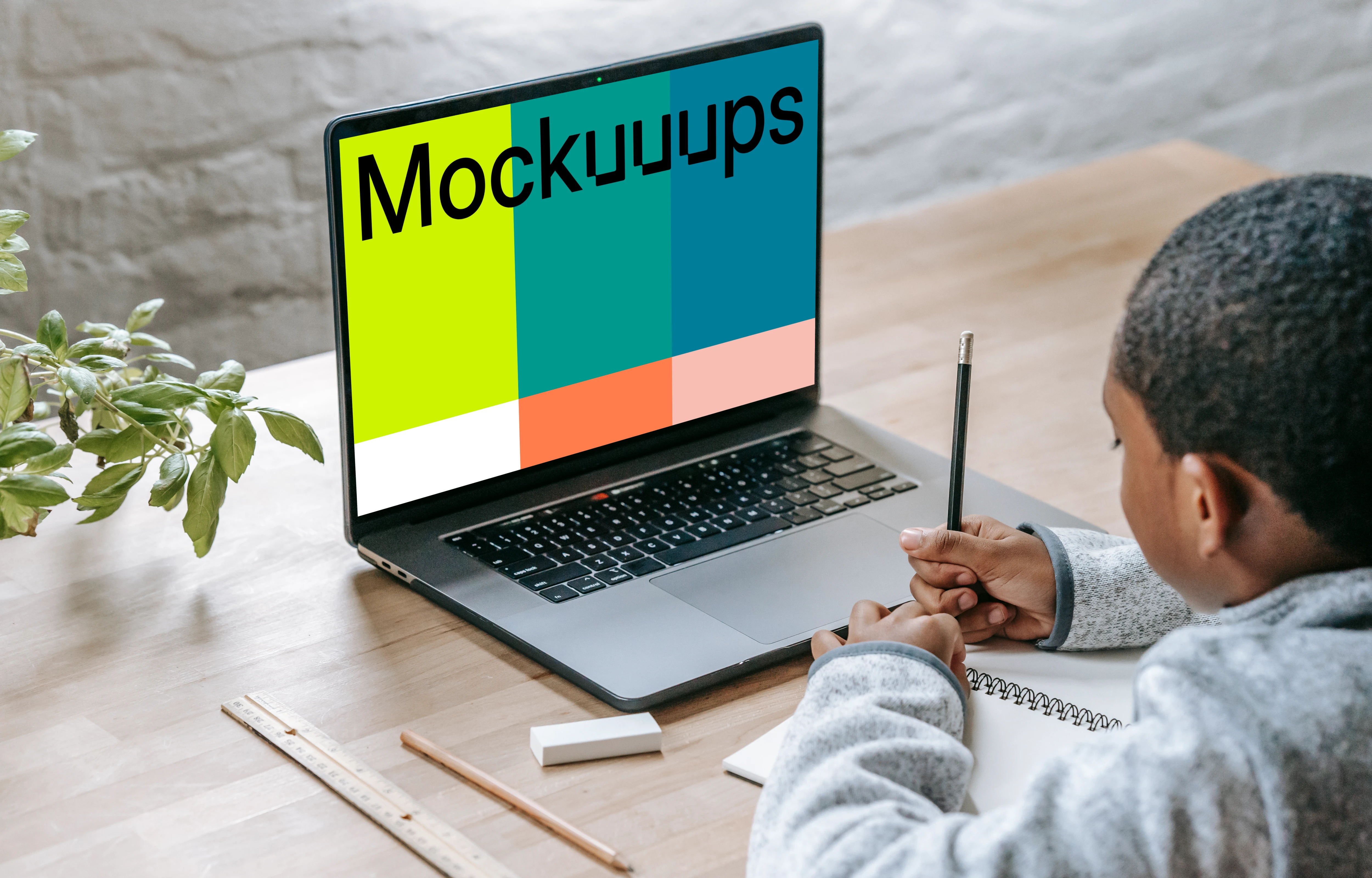 Young boy using laptop mockup