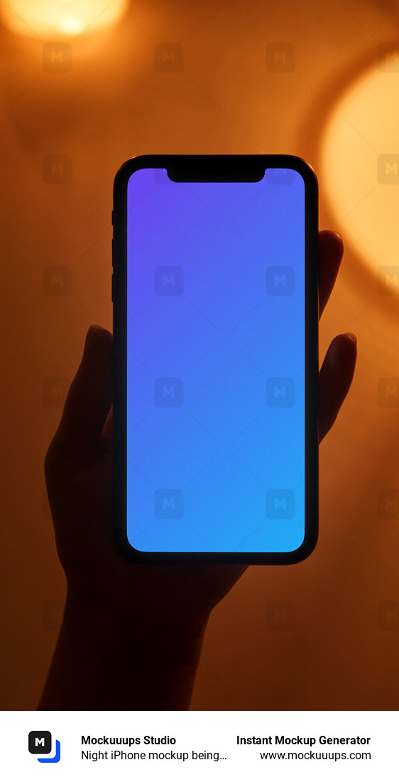 Night iPhone mockup being held by user