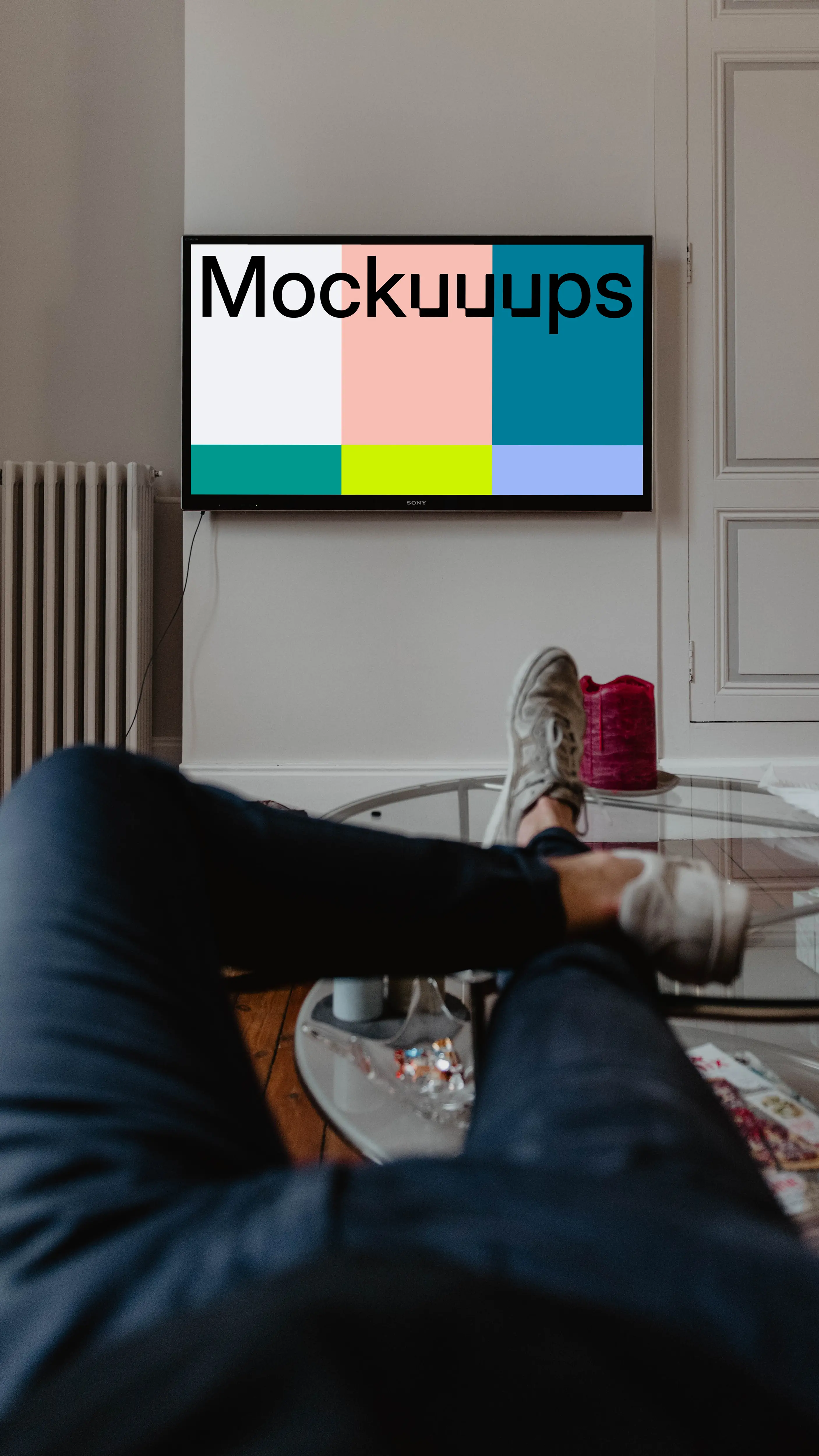 4K television mockup on a white wall