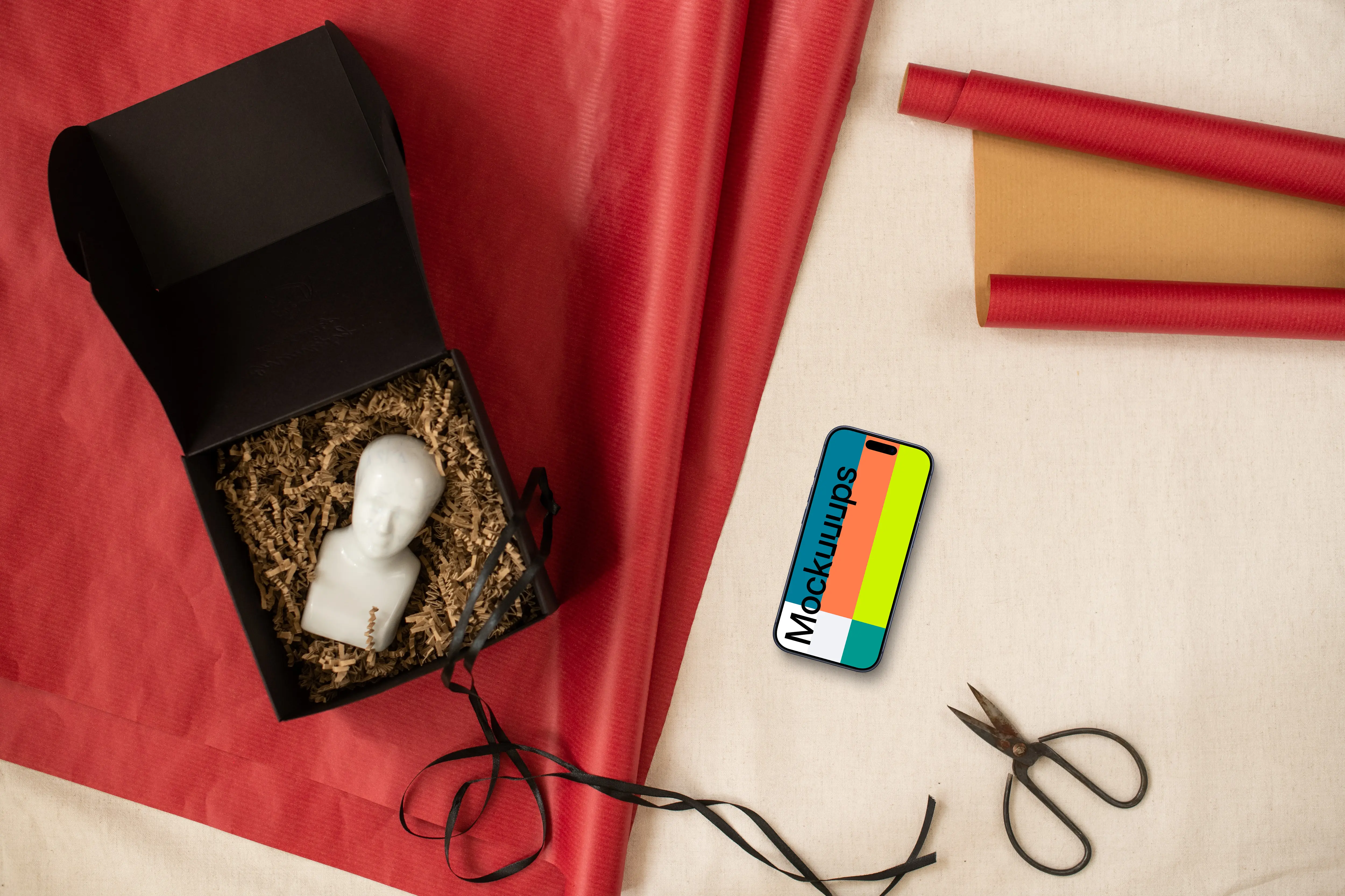 Christmas gift mockup with a phone on the side