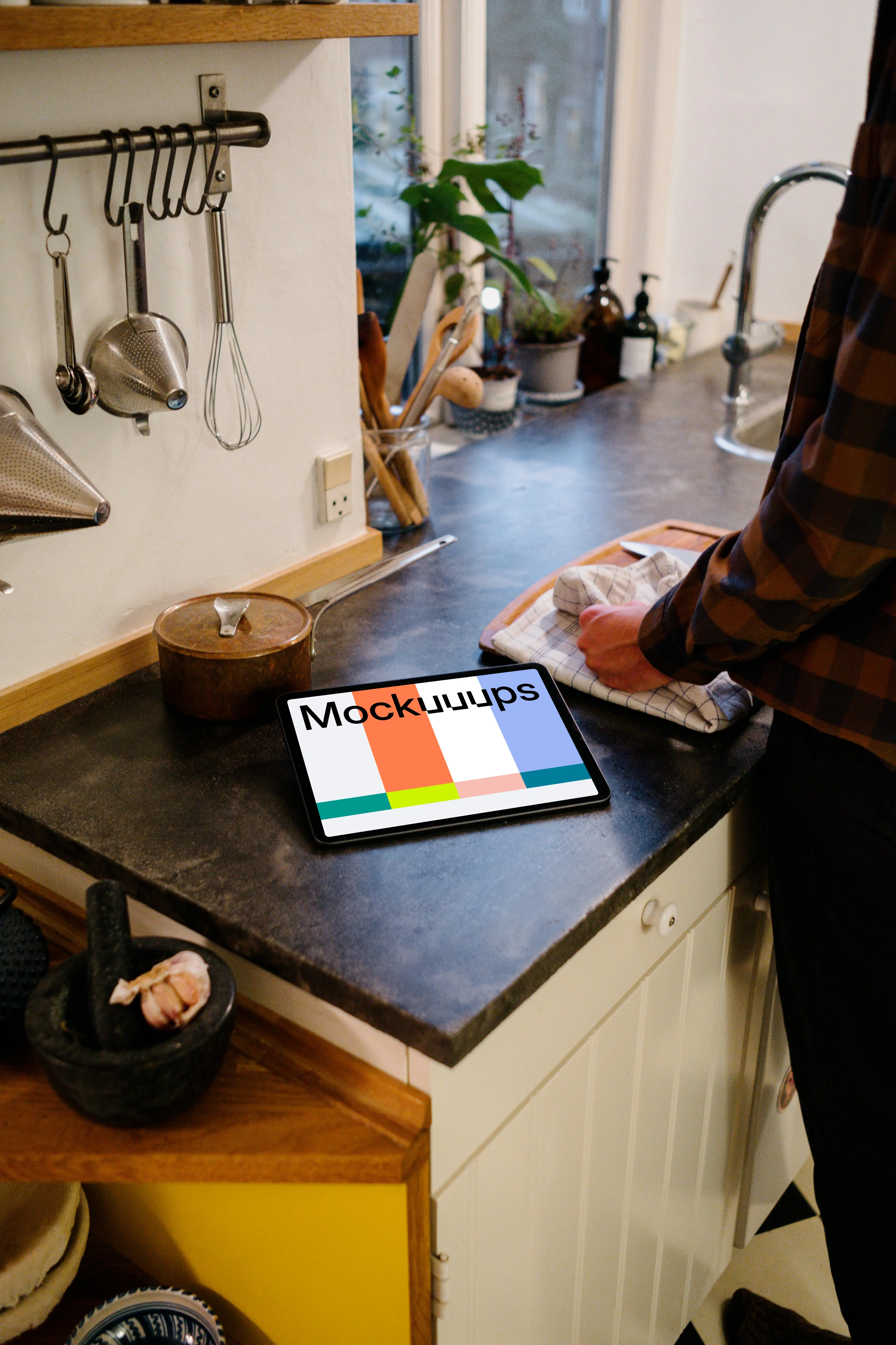 iPad Air Mockup on a kitchen counter beside a pot
