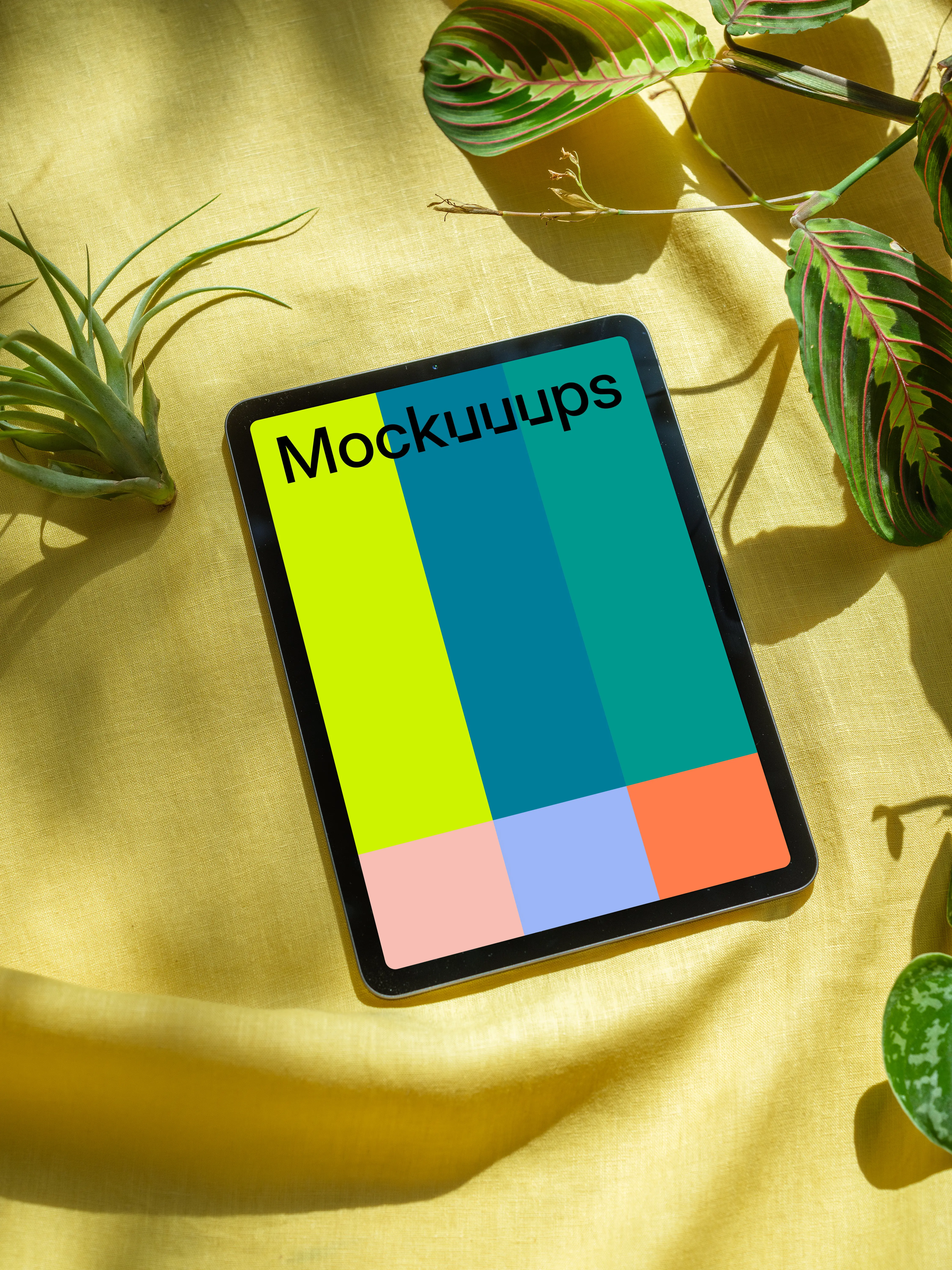 iPad Air mockup on a yellow fabric