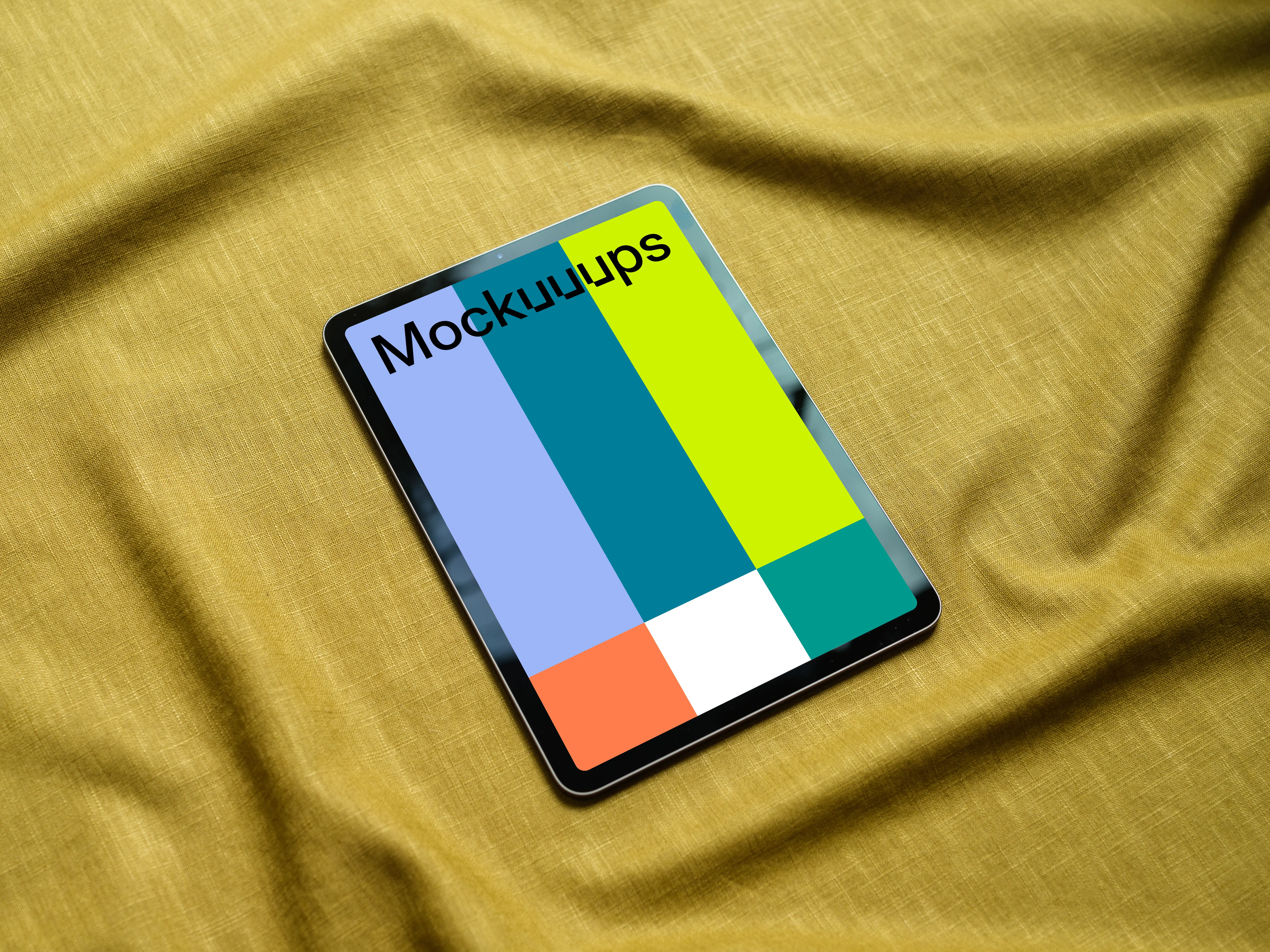 iPad mockup on a yellow tablecloth