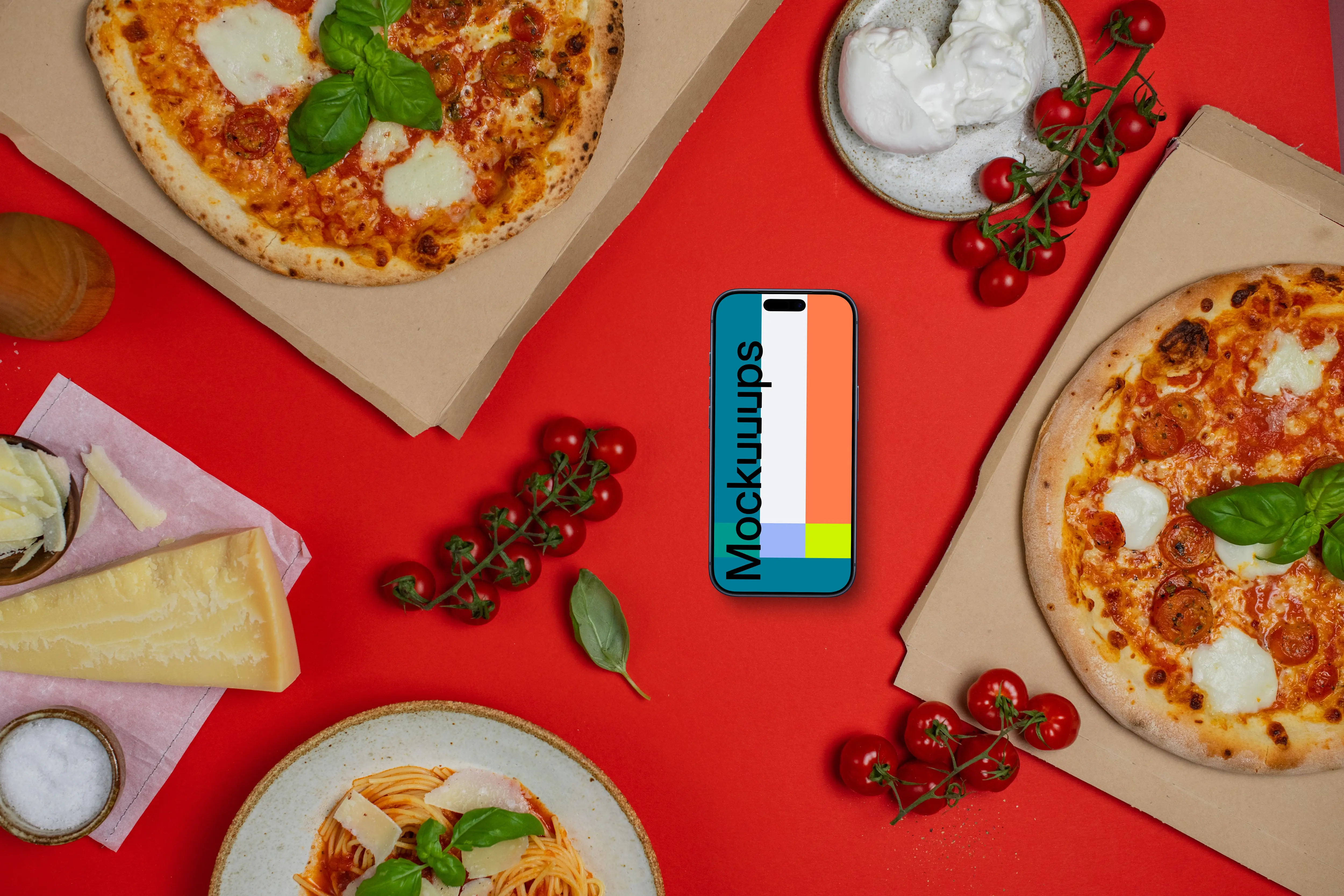 Phone mockup between pizza boxes 
