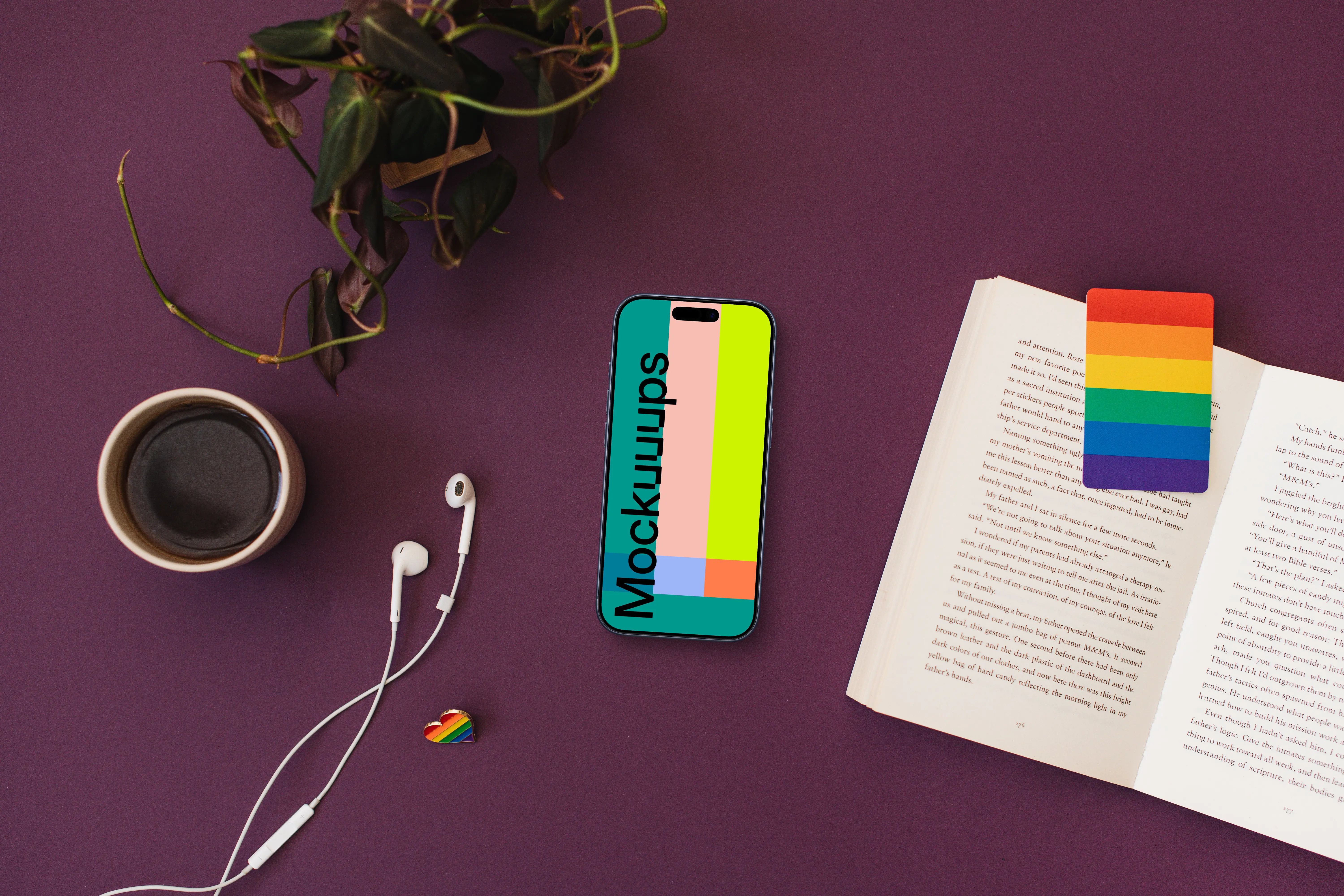 Smartphone mockup with headphones and LGBT decorations