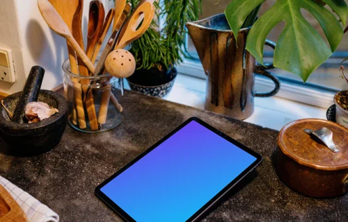 iPad Air mockup on a black kitchen countertop