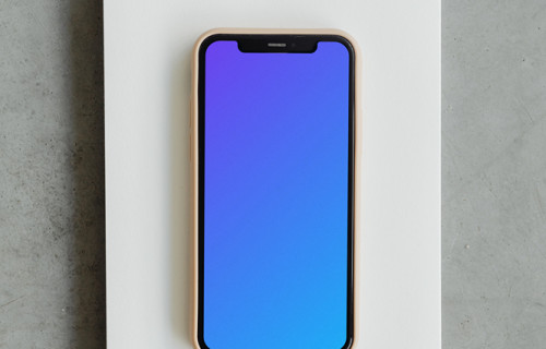 Minimal iPhone mockup on a jotter