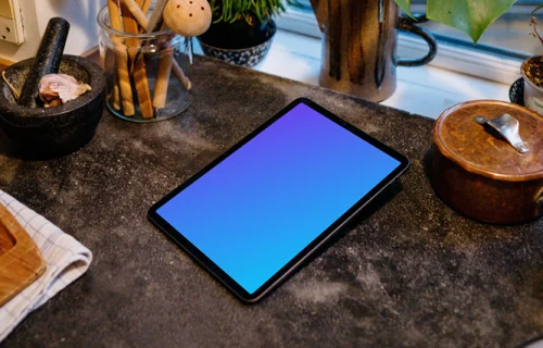 iPad Air mockup on a black kitchen countertop
