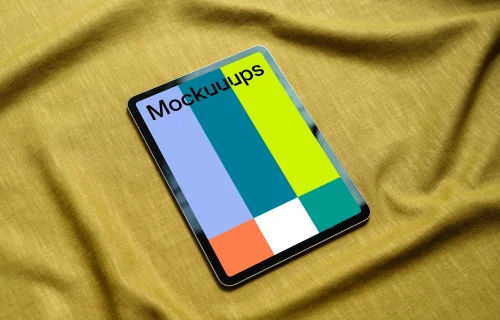 iPad mockup on a yellow tablecloth