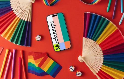 Smartphone mockup in red scene with pride decorations