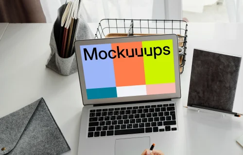 Young girl using a MacBook Air with a bag by the side mockup