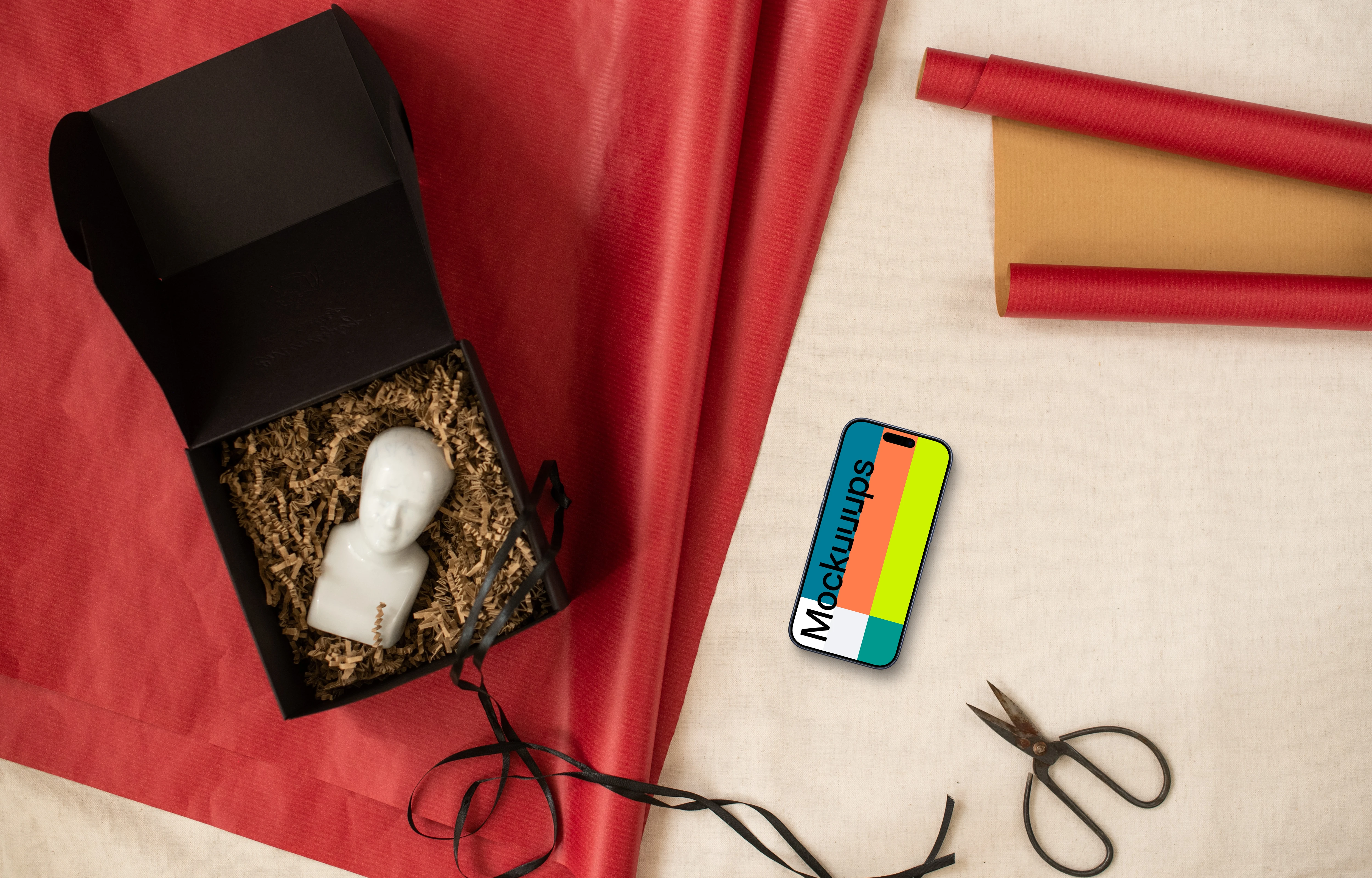 Christmas gift mockup with a phone on the side