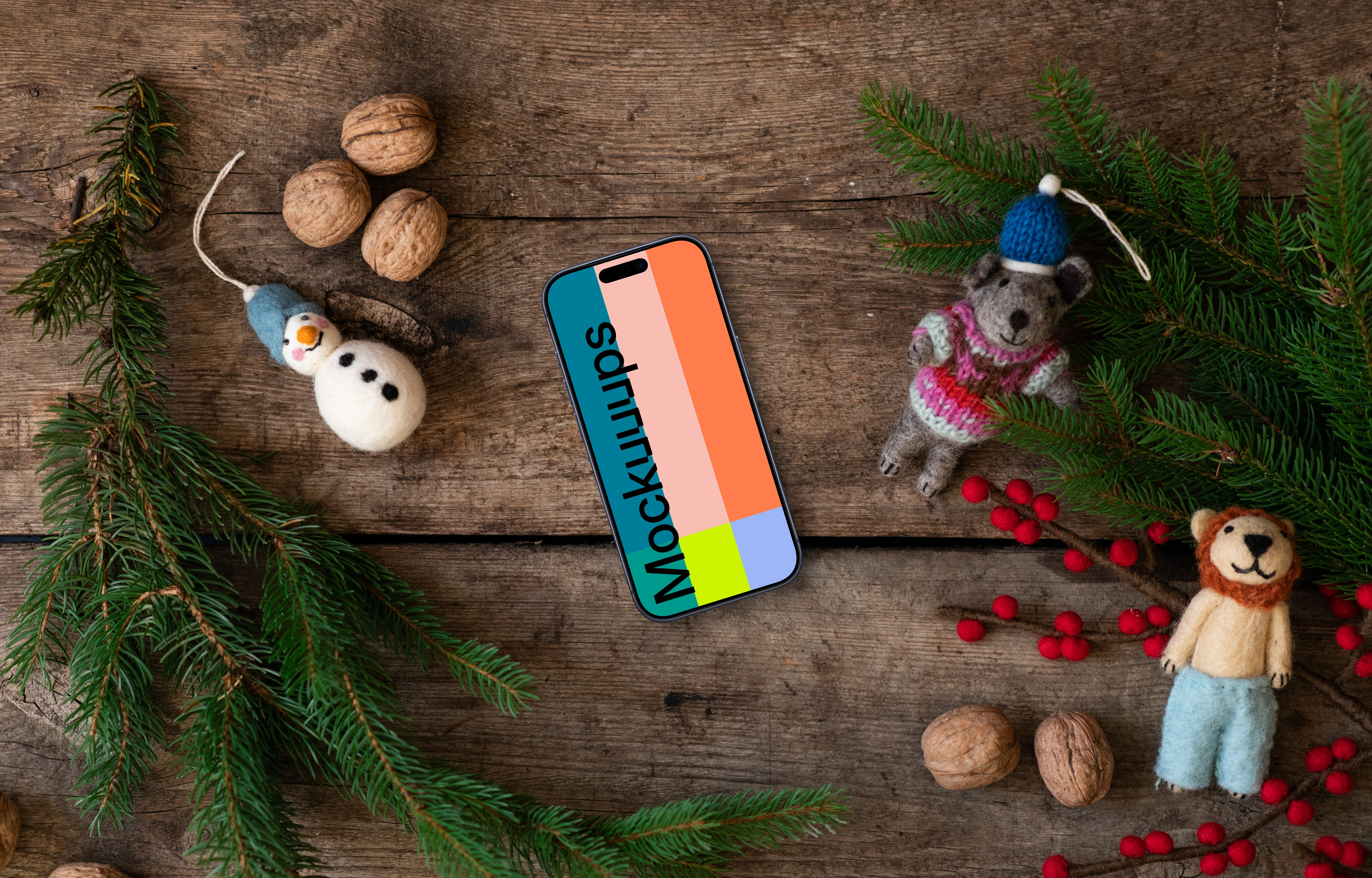 Christmas mockup with a smartphone and decorations