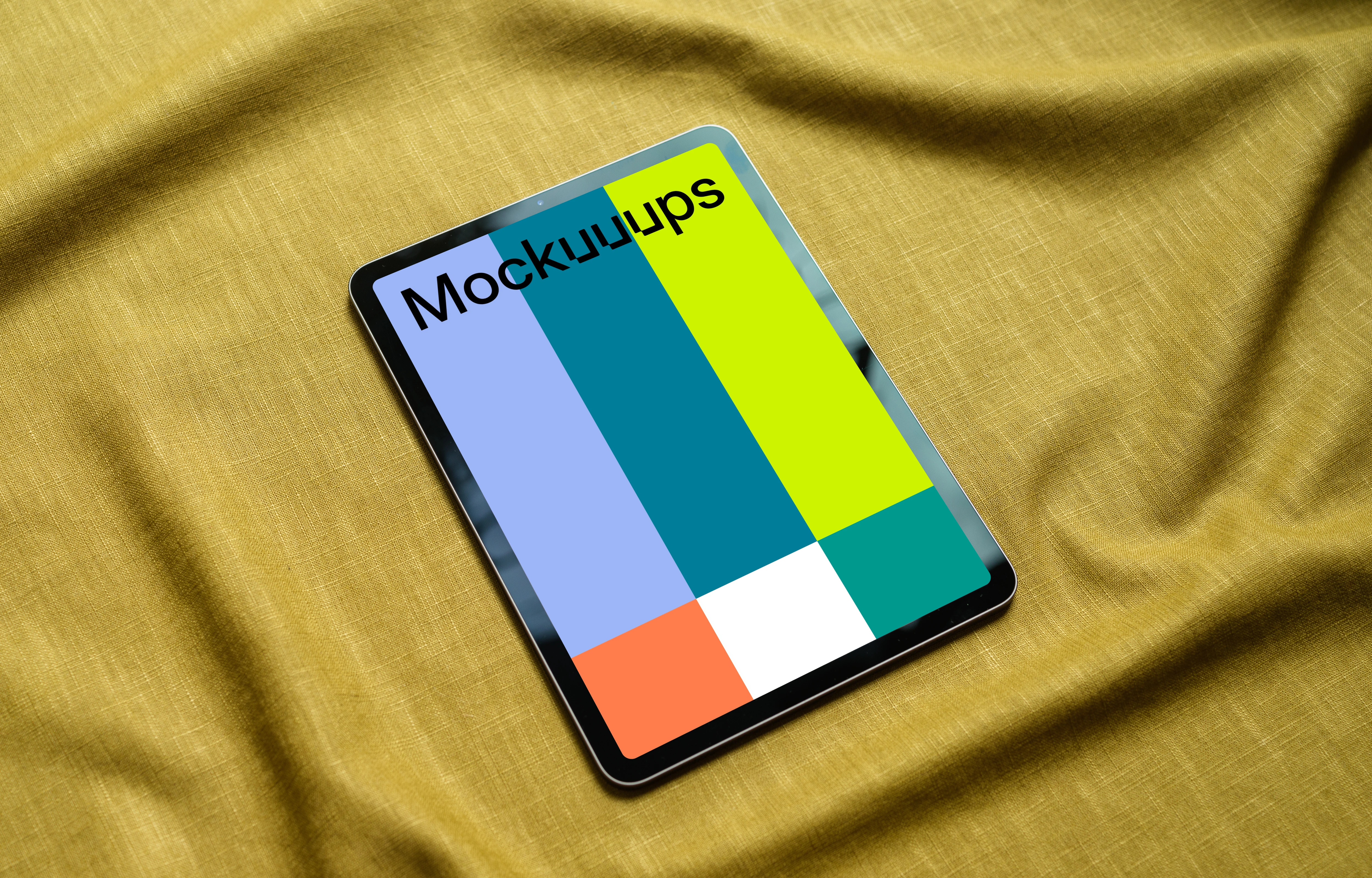 iPad mockup on a yellow tablecloth