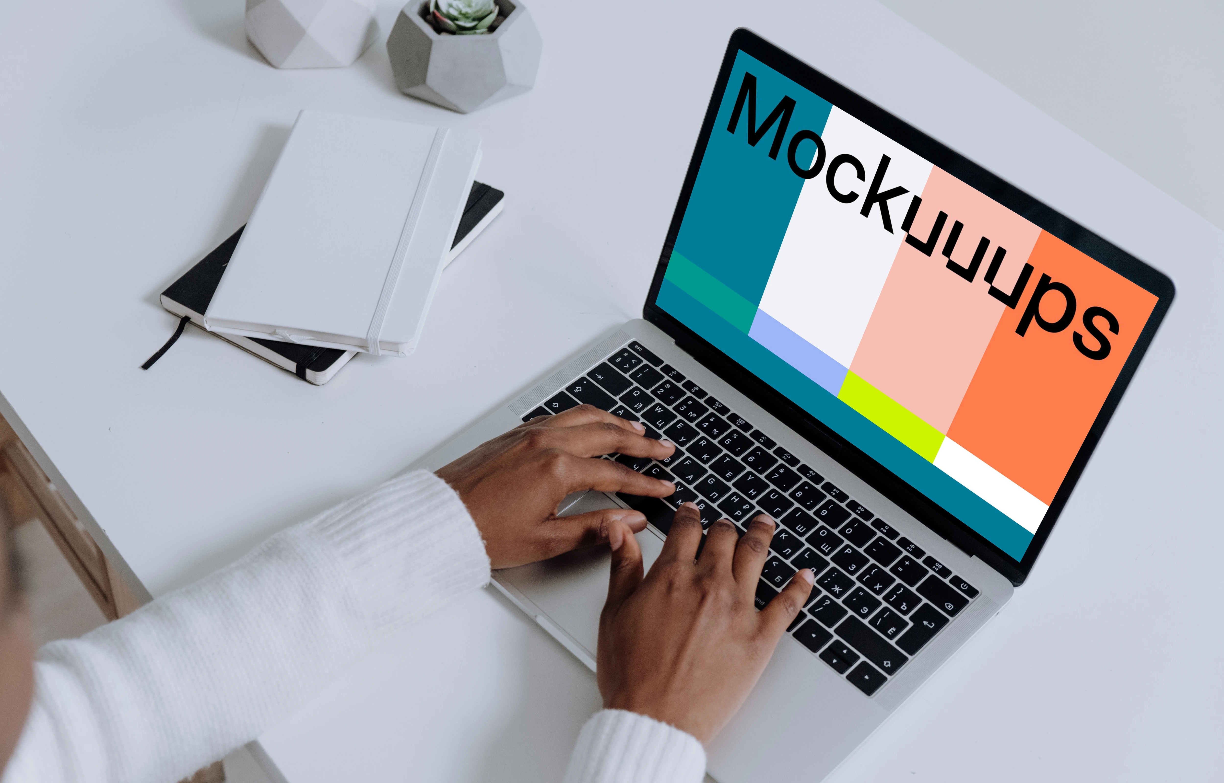 MacBook Pro mockup on a white table