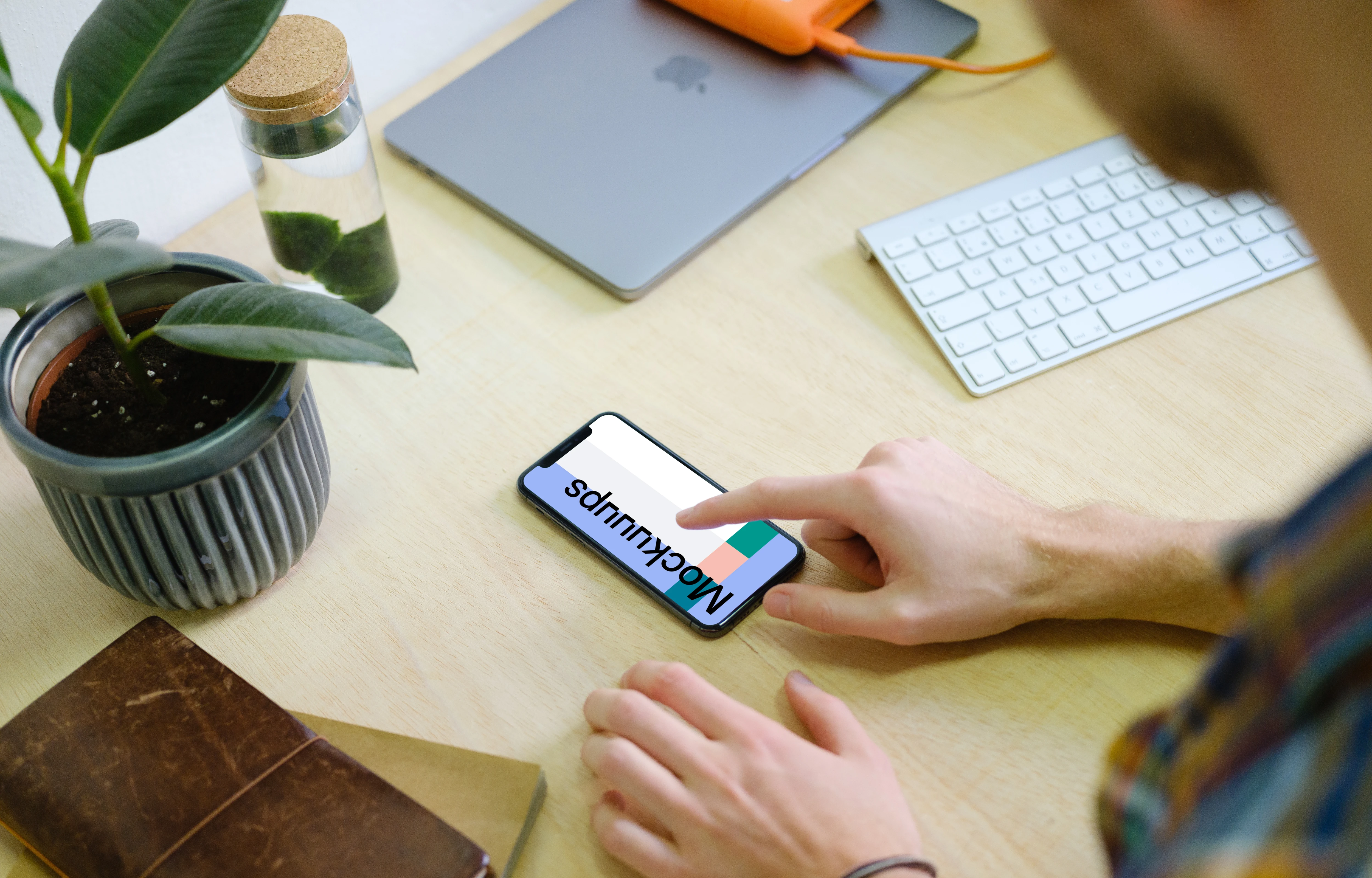 Man tapping on the iPhone 11 mockup screen