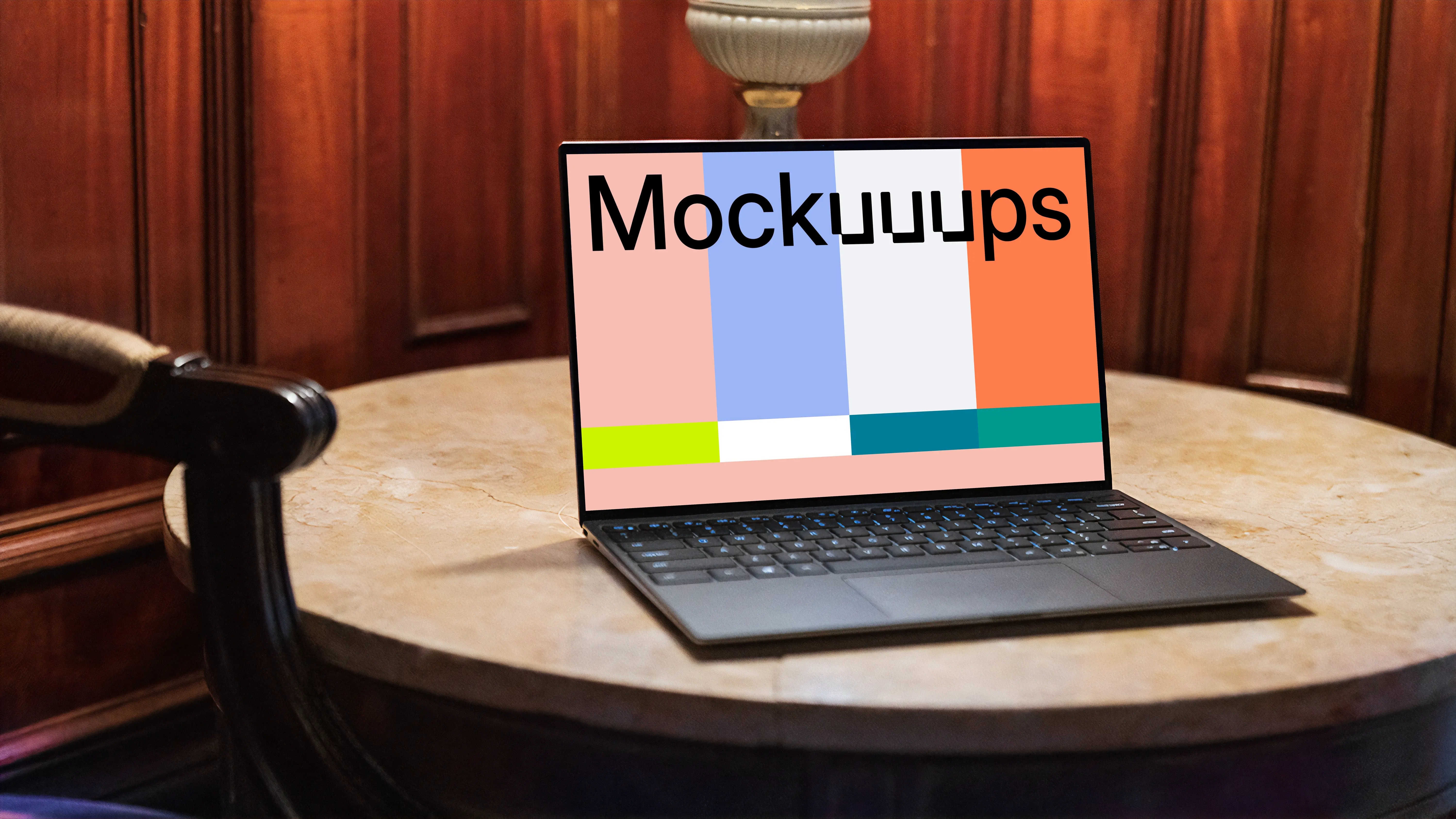 Black Dell XPS Mockup on a table with furniture