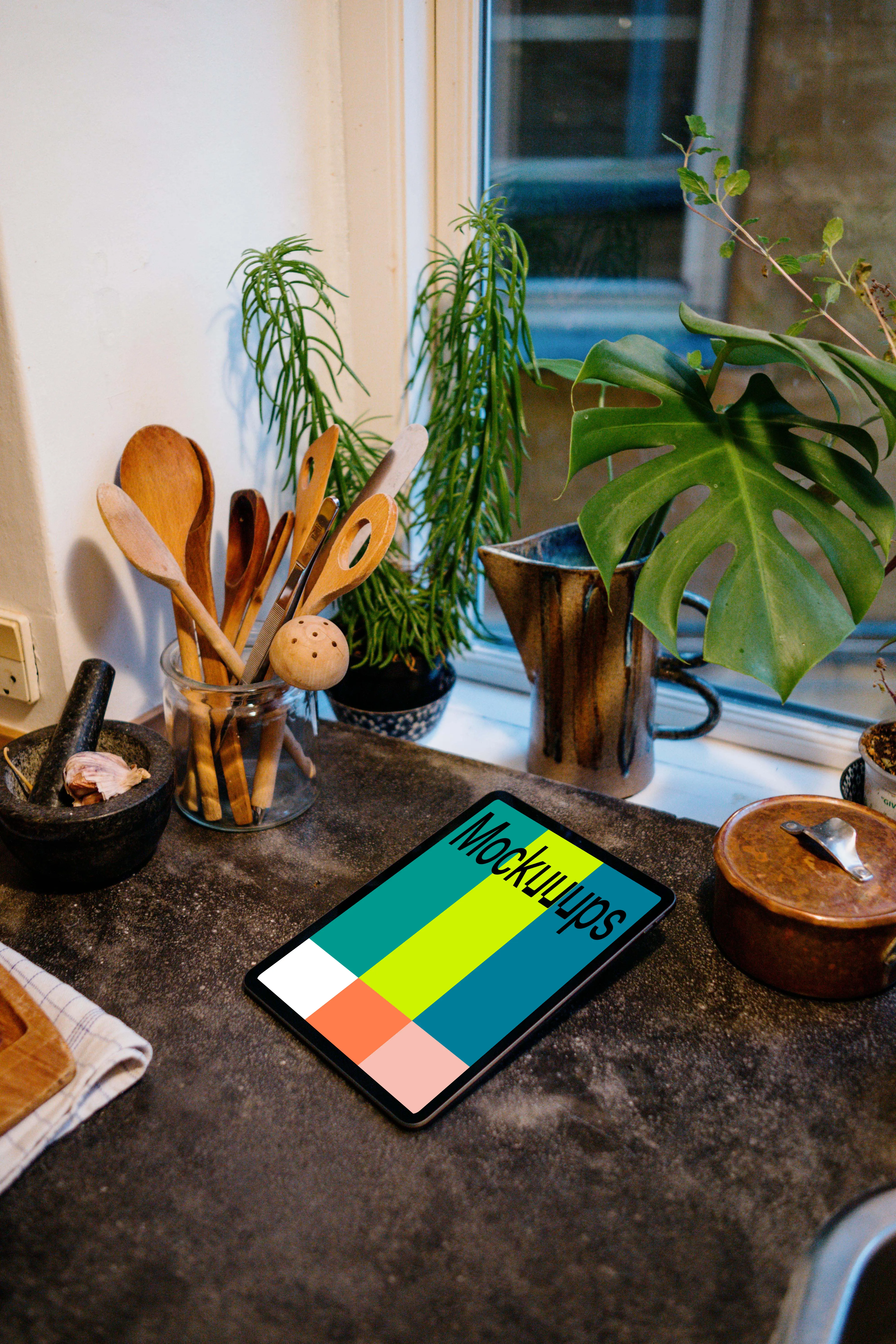 iPad Air mockup on a black kitchen countertop