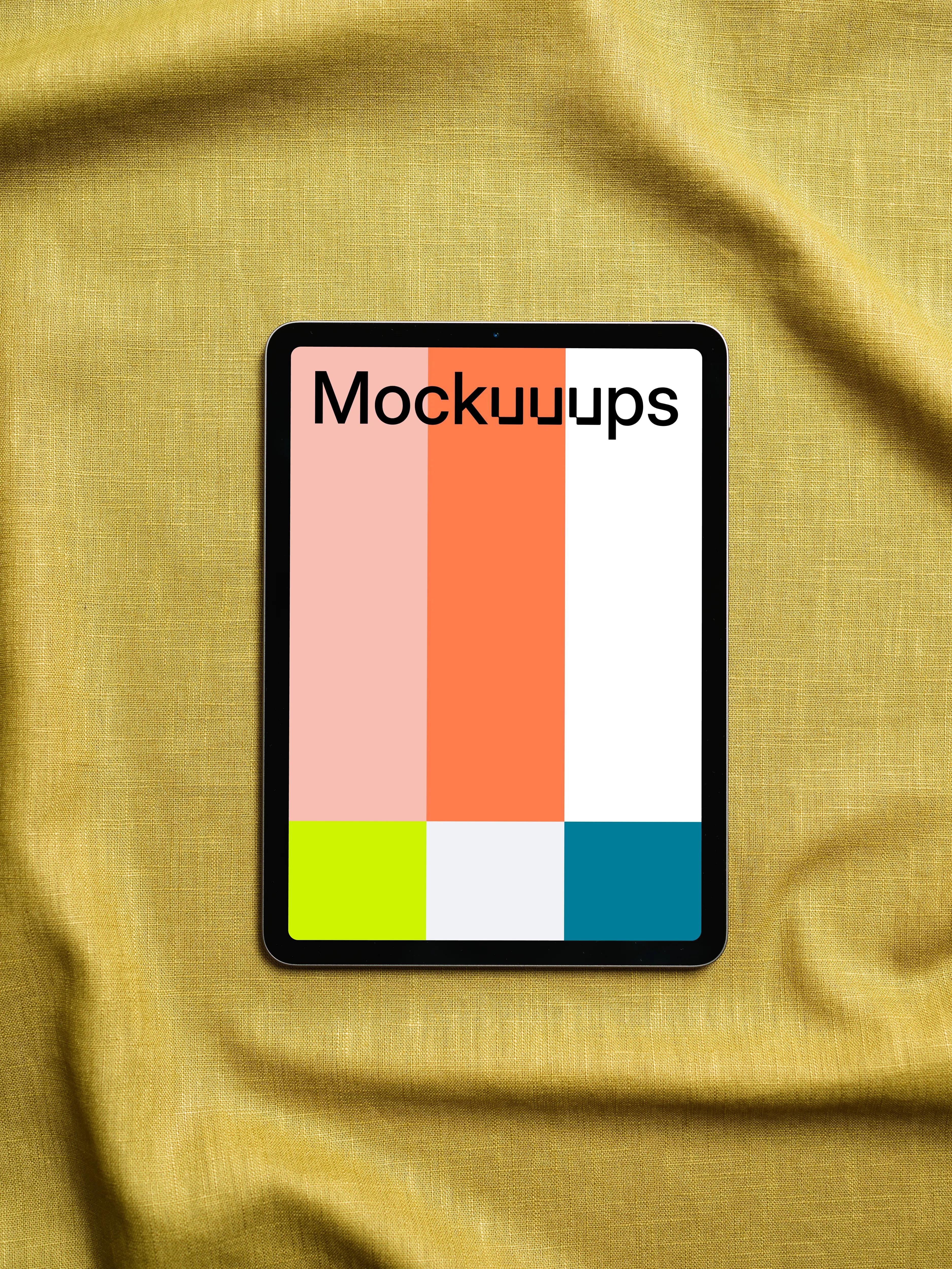 iPad Air mockup on yellow fabric