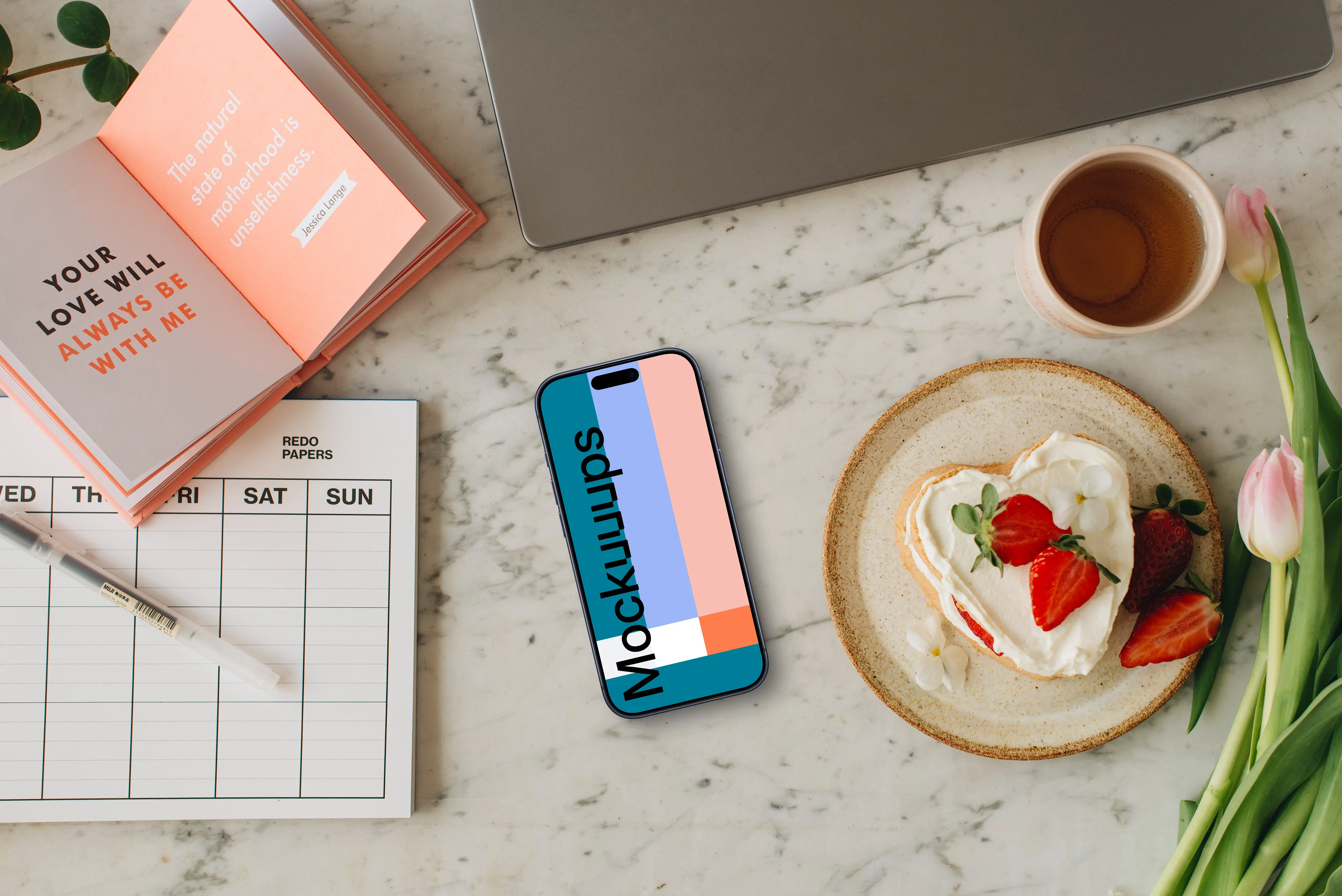 iPhone mockup in the center of Mother’s Day setup