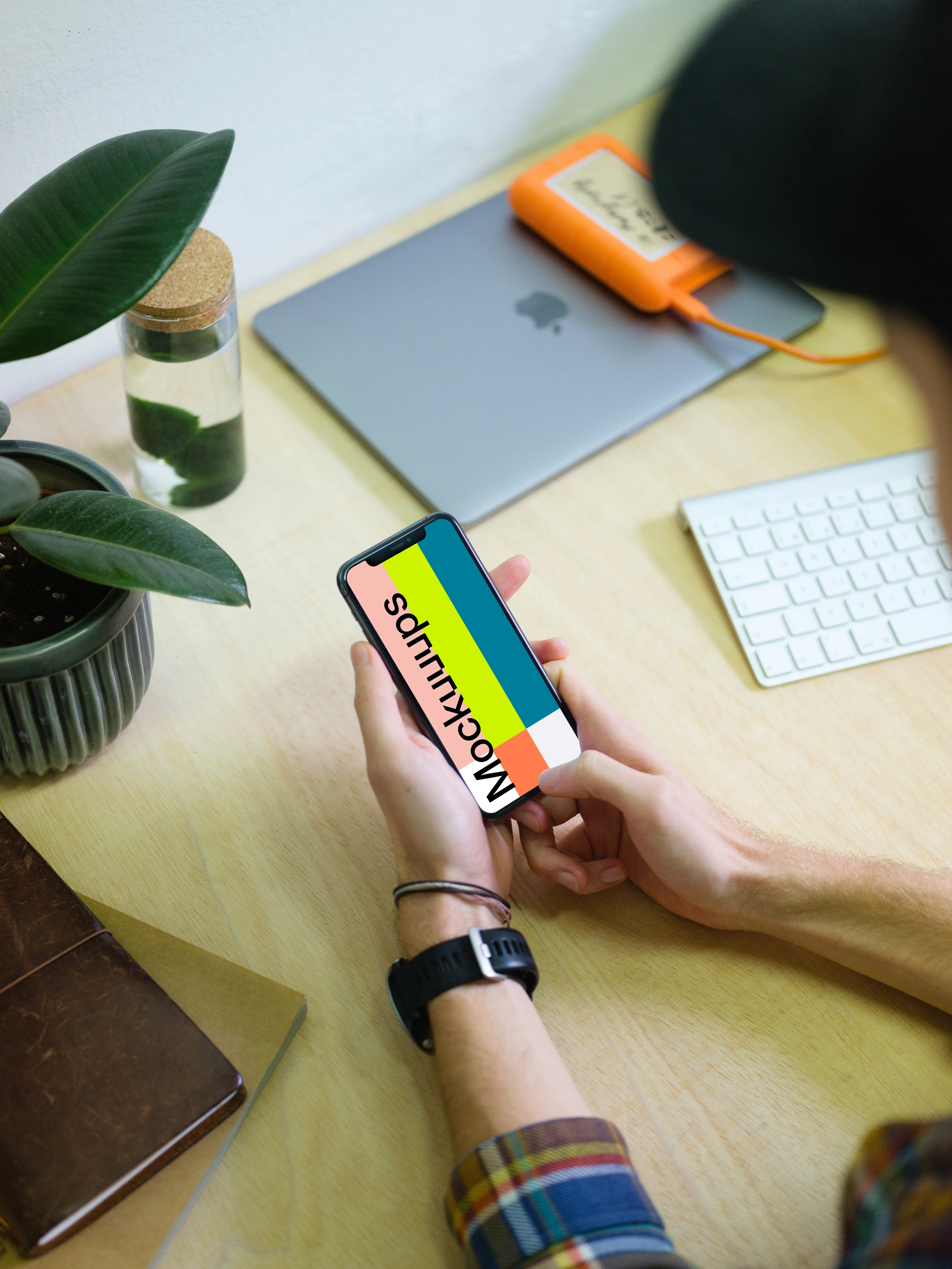 Man holding iPhone 11 mockup