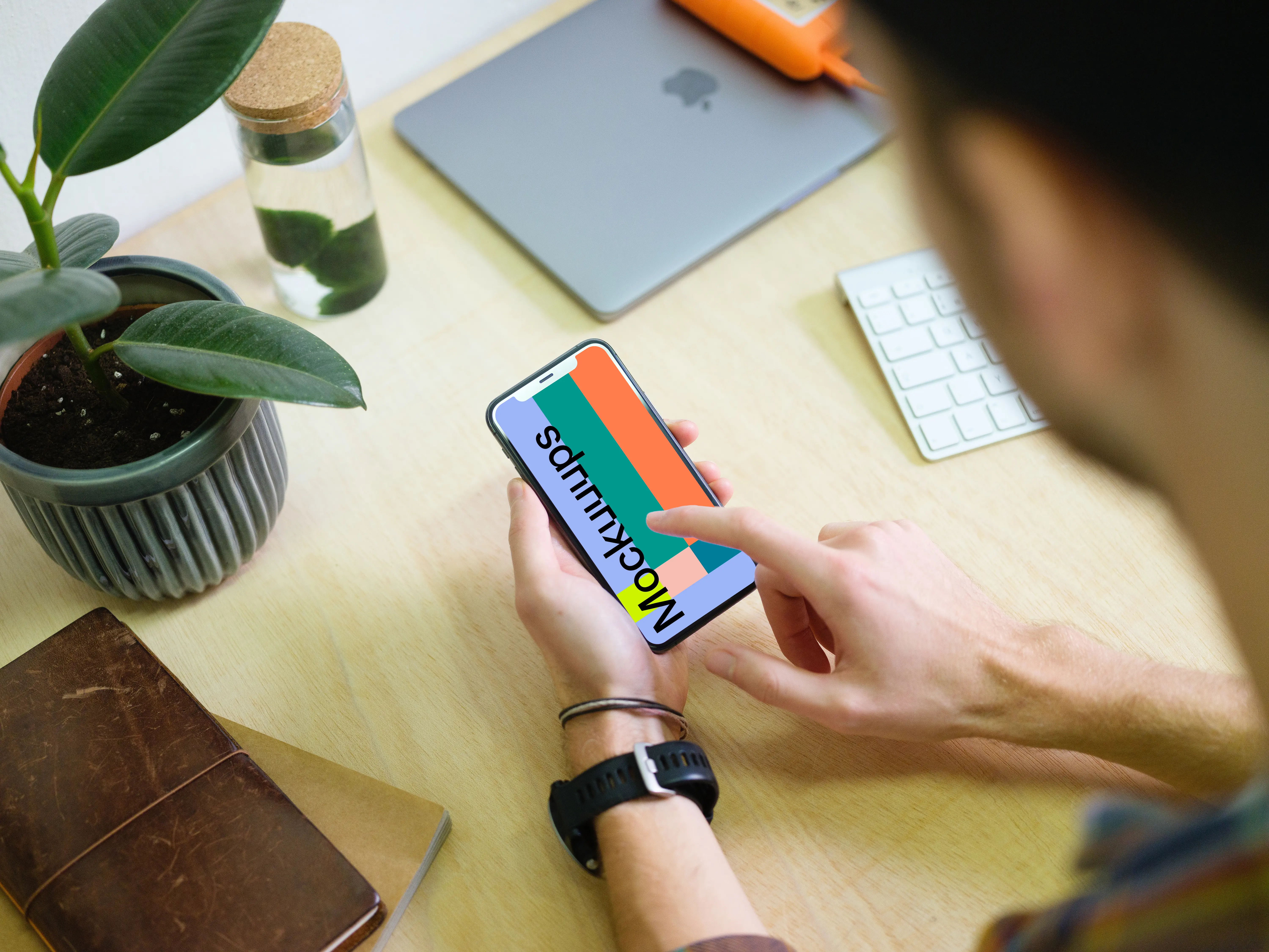 Man interacting with iPhone 11 mockup