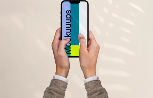 Free mockup of woman holding a smartphone