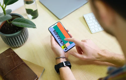 Man interacting with iPhone 11 mockup