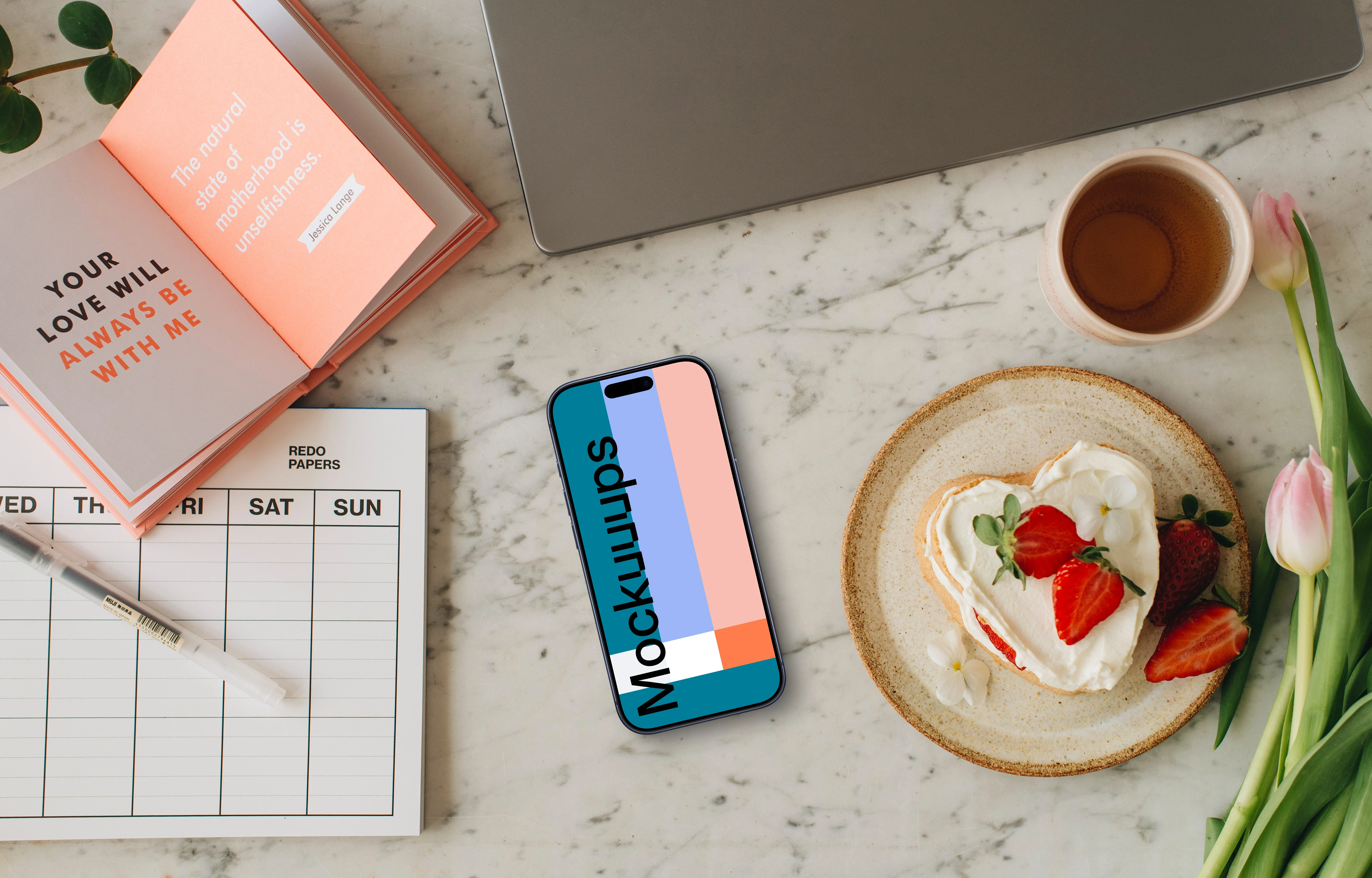 iPhone mockup in the center of Mother’s Day setup