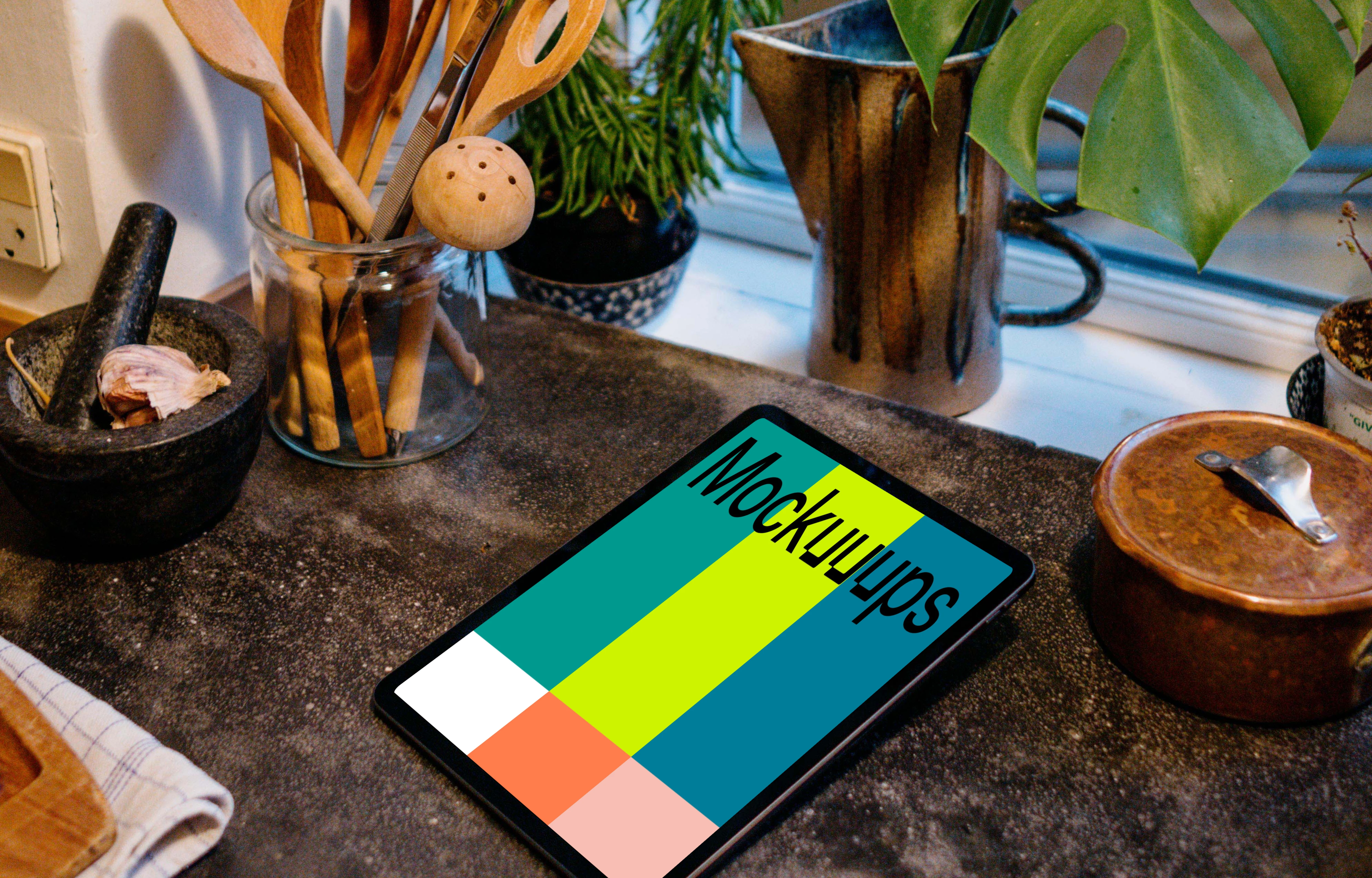 iPad Air mockup on a black kitchen countertop