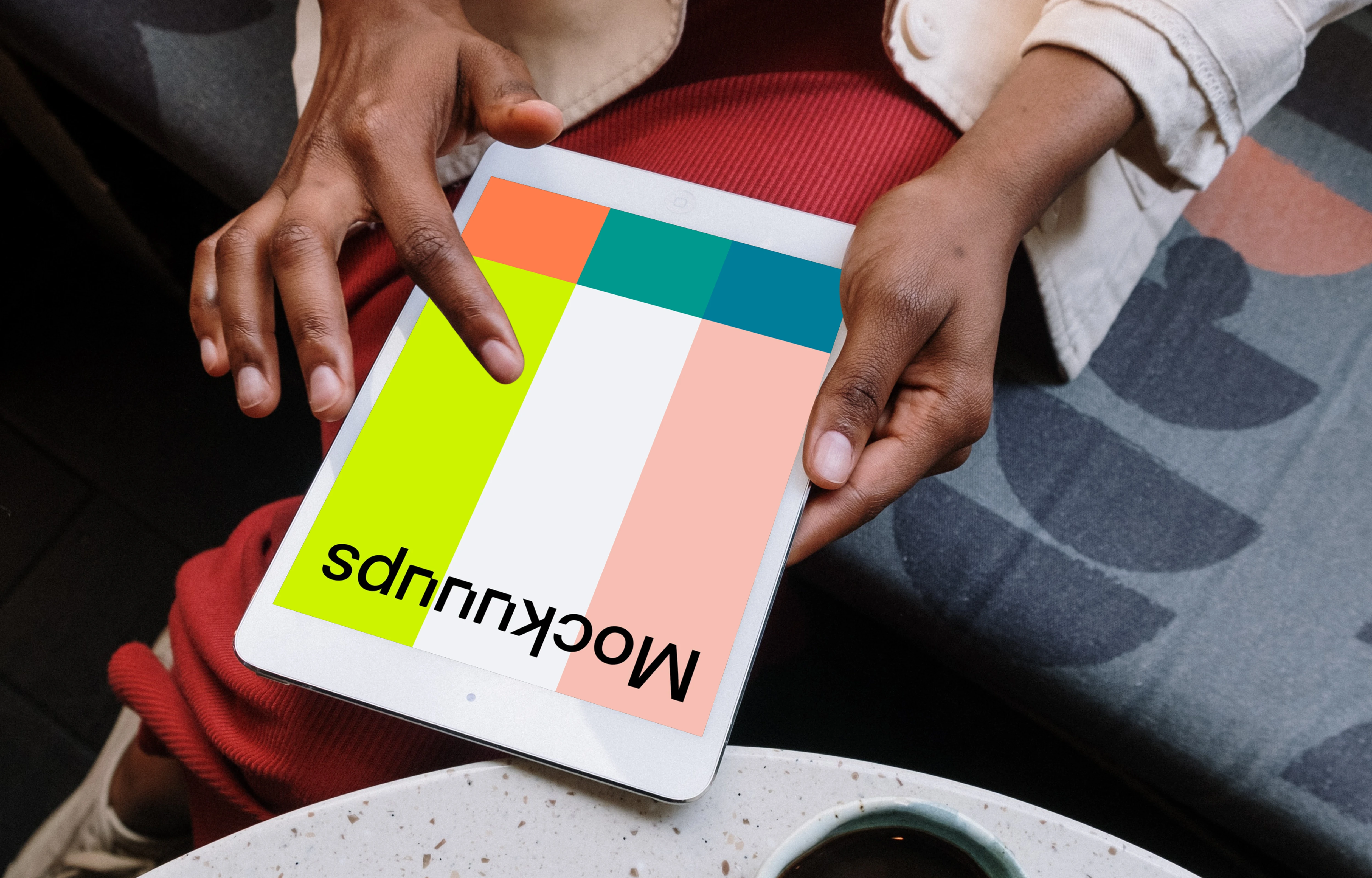 iPad Mini mockup front view in a black ladies hand