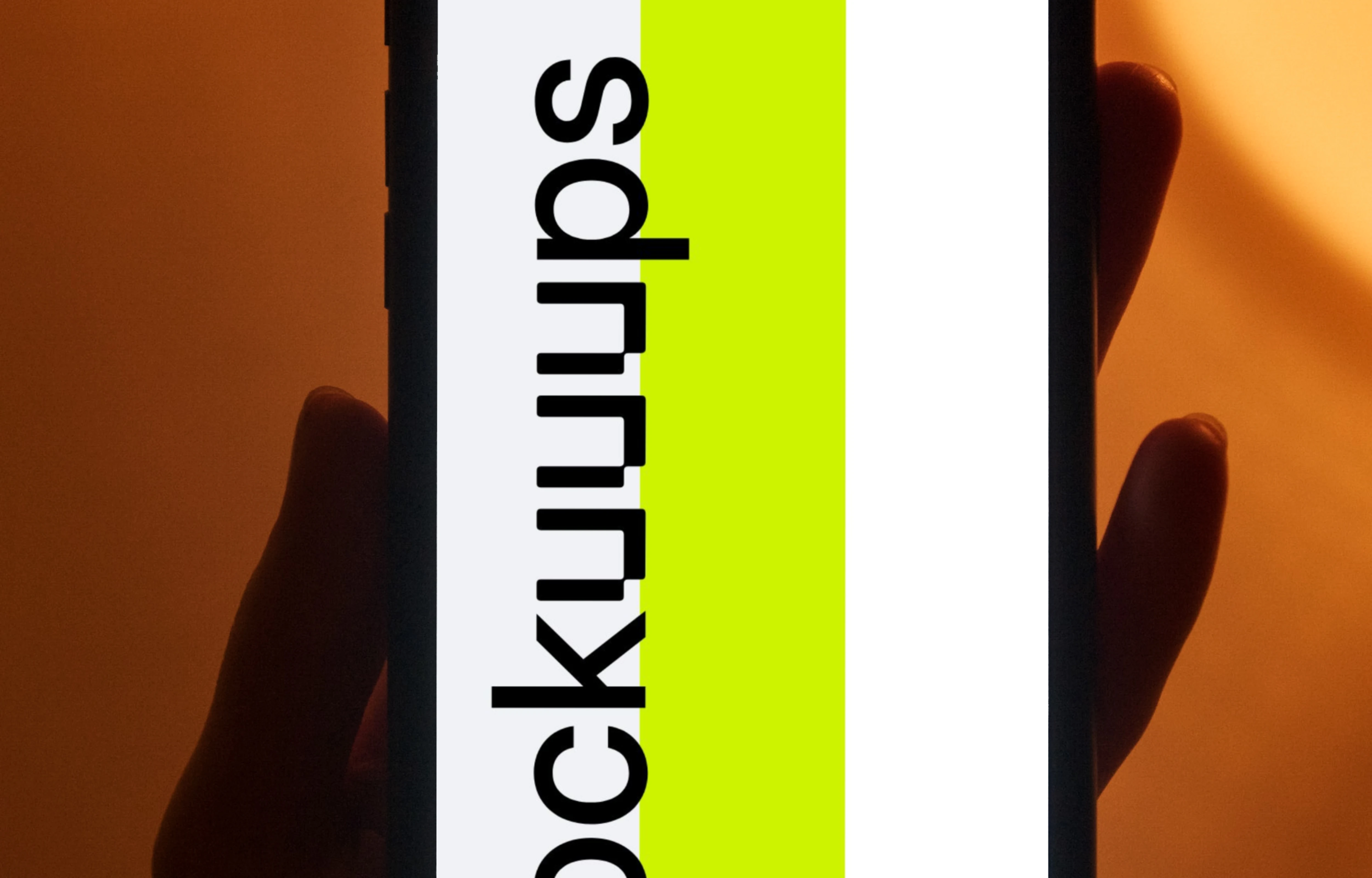 Night iPhone mockup being held by user