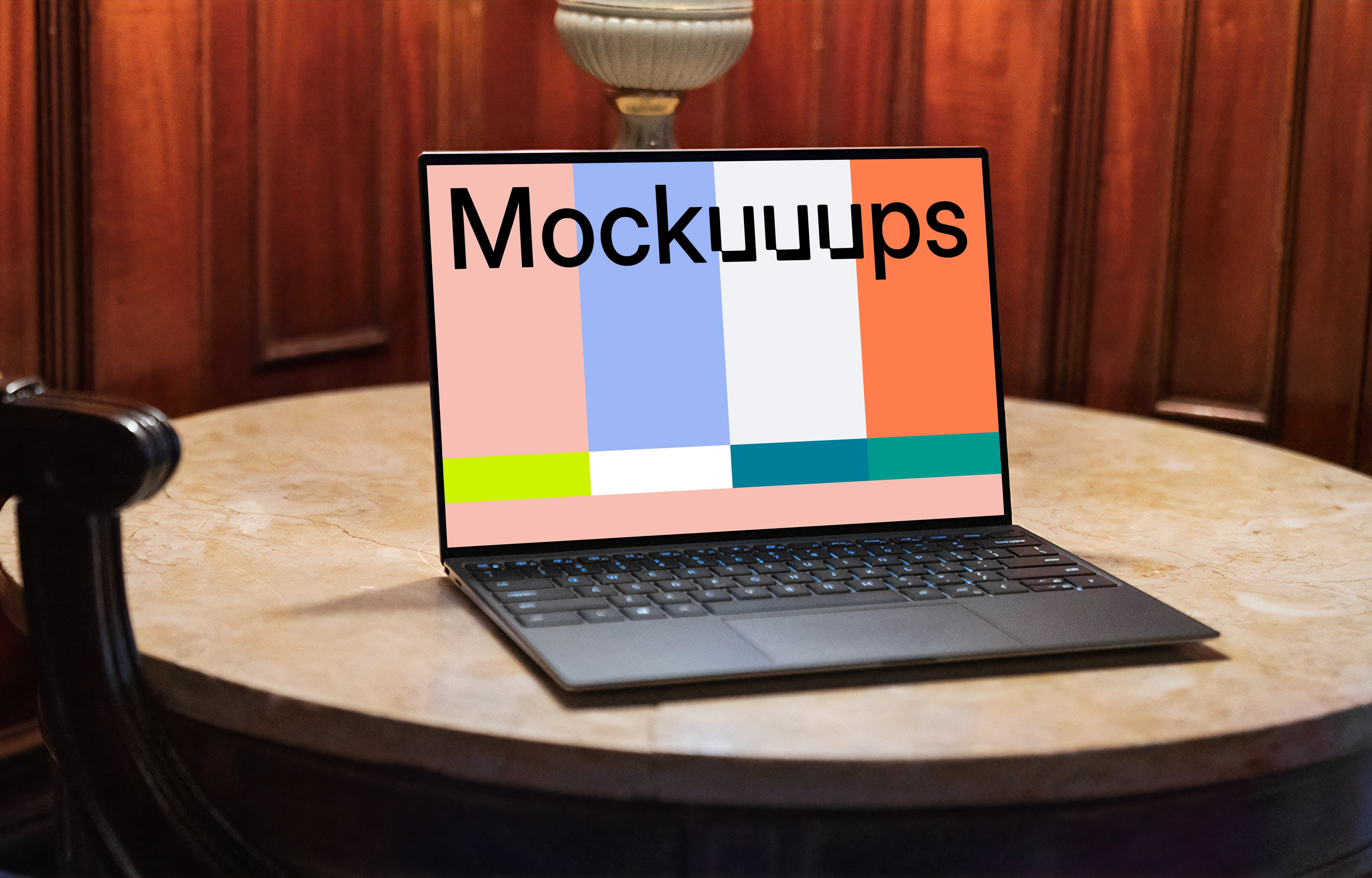 Black Dell XPS Mockup on a table with furniture