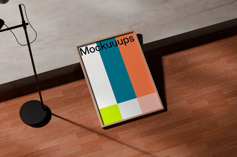 A3 poster mockup leaning on a wall with a wooden floor mockup