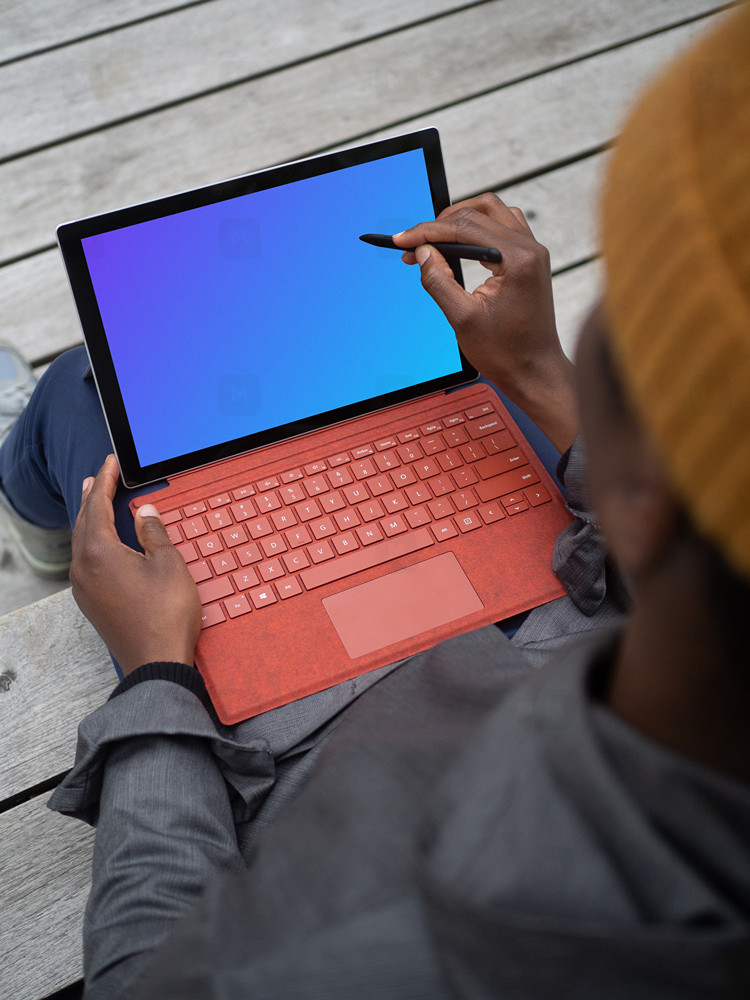 Man with Microsoft Surface Mockup