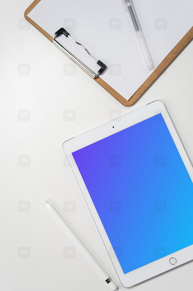 Tablet mockup with clipboard and pen
