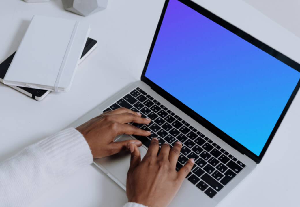 MacBook Pro mockup on a white table