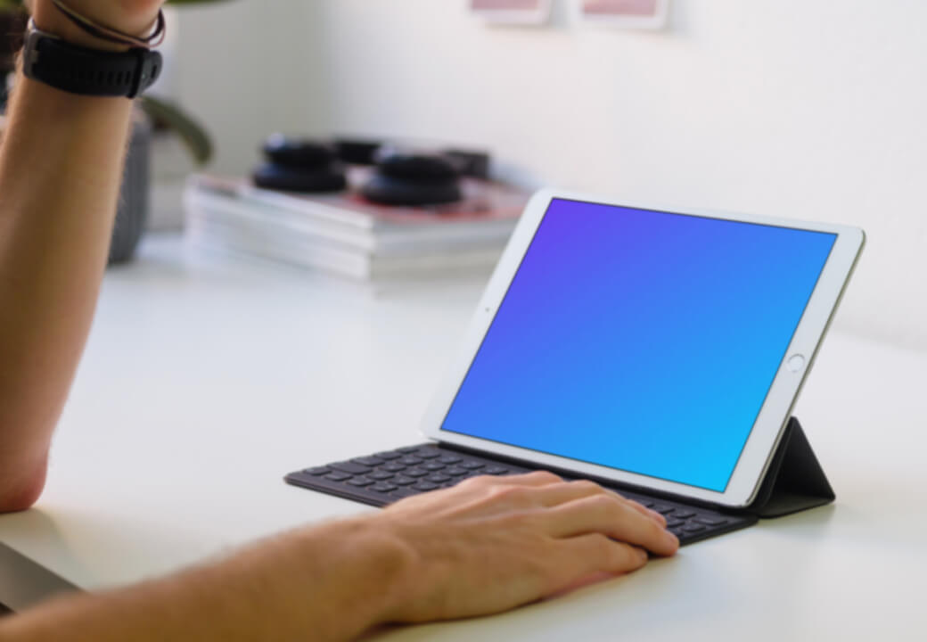 Young man working on the iPad Pro mockup